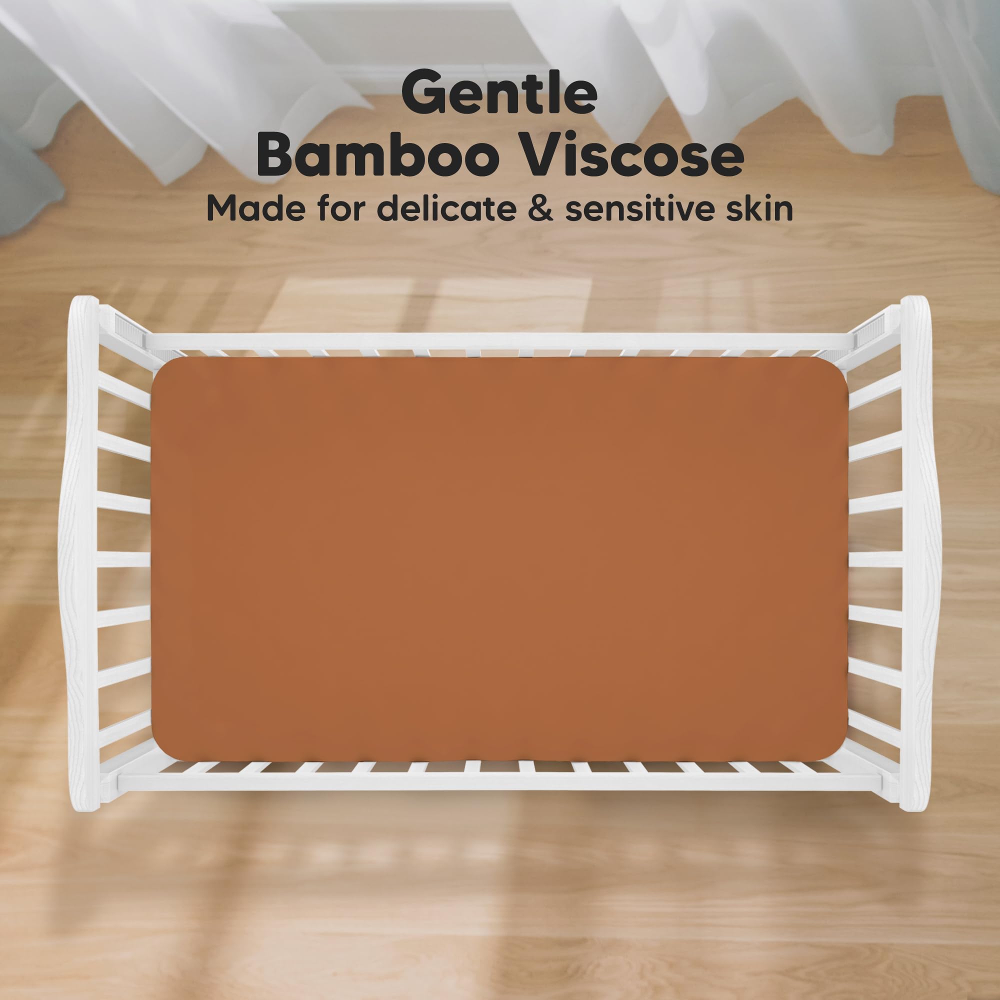KeaBabies 2-pack crib sheets rust on mattress demonstrates snug fit for secure bedding