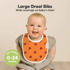KeaBabies 8-pack bibs worn by baby demonstrates full-coverage protection against drool and spills.