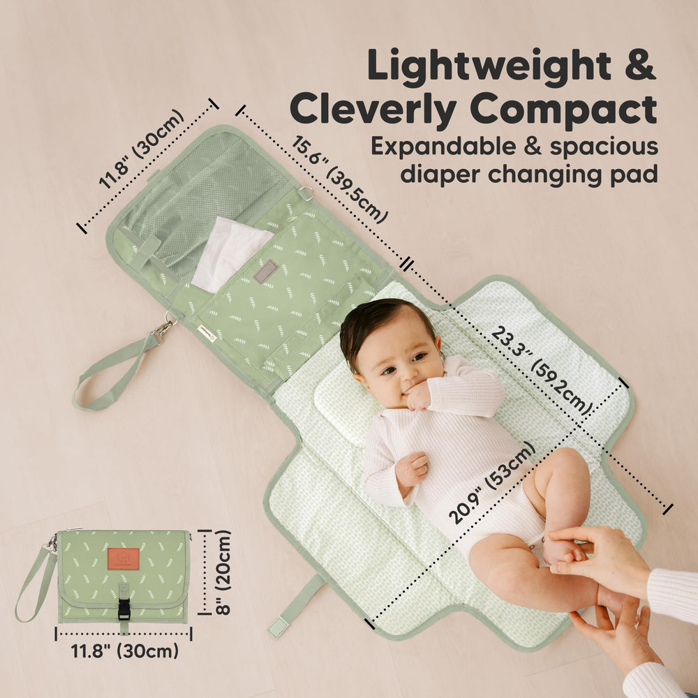 KeaBabies Acacia changing pad open shows plush padding and head pillow.