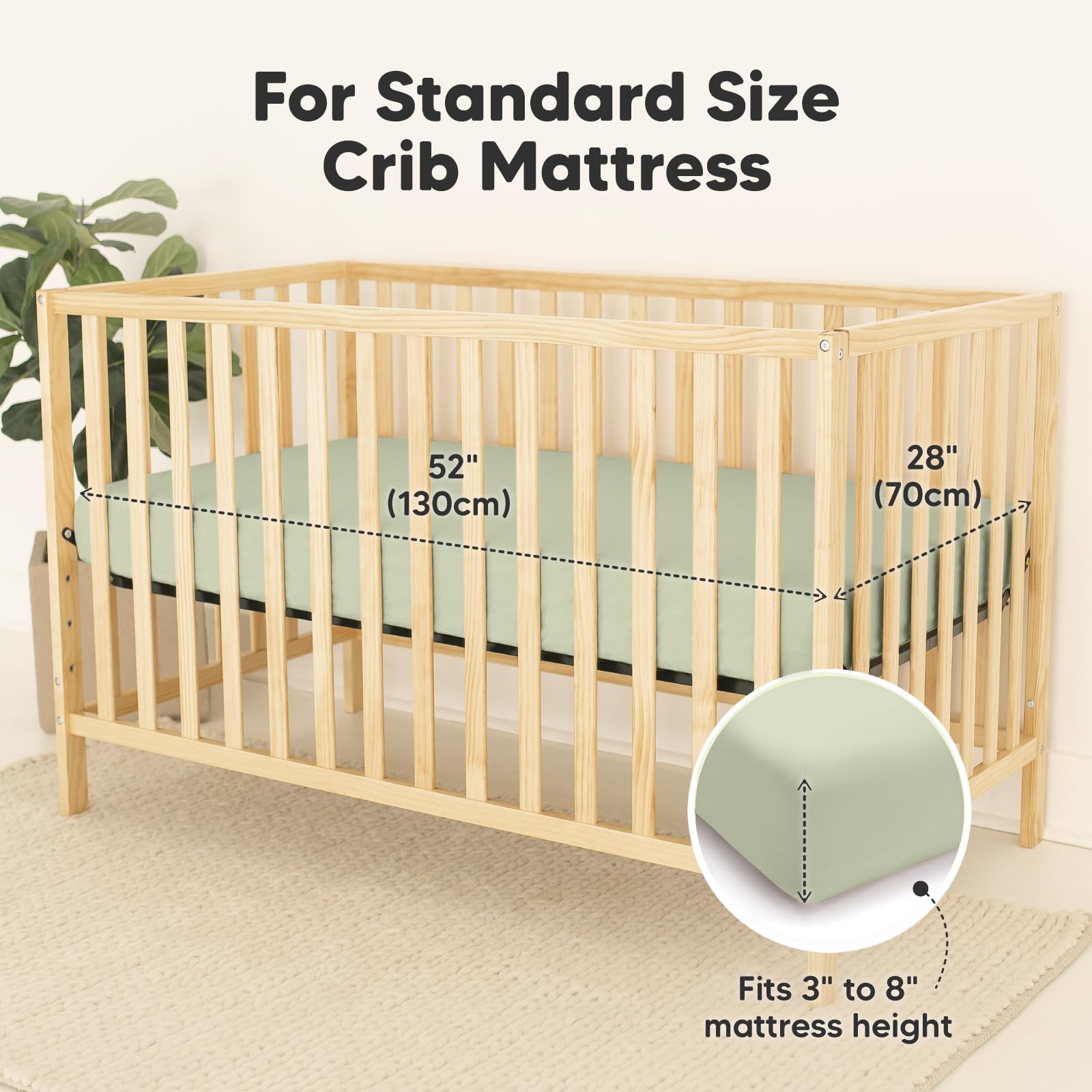 KeaBabies avocado crib sheet on mattress demonstrates snug fit for secure sleep.