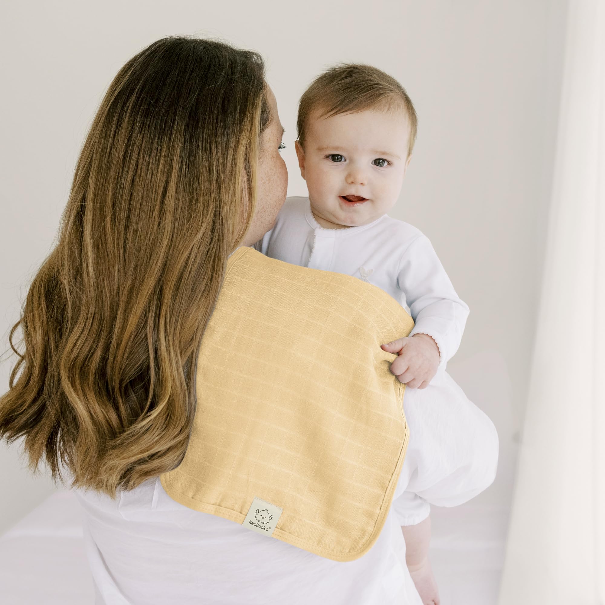 KeaBabies baby burp cloths in use for everyday messes.