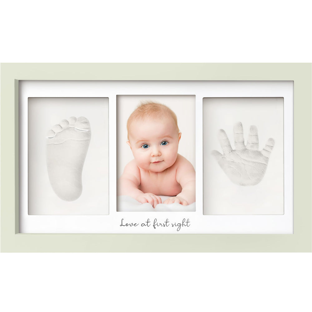 KeaBabies handprint frame closeup with glass cover and wood frame.