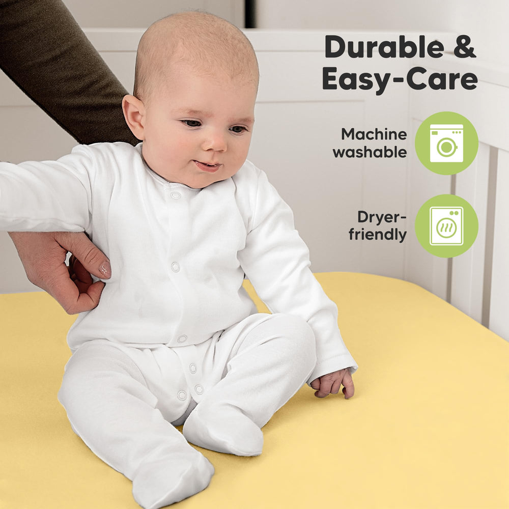 KeaBabies baby nursery scene featuring Sunshine sheets in a neutral room.