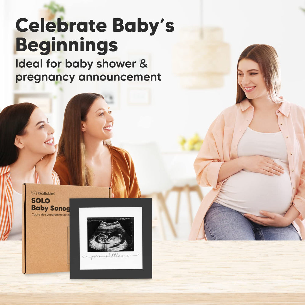 Keababies Baby Sonogram Display sits on a shelf, simplifying keepsake organization.