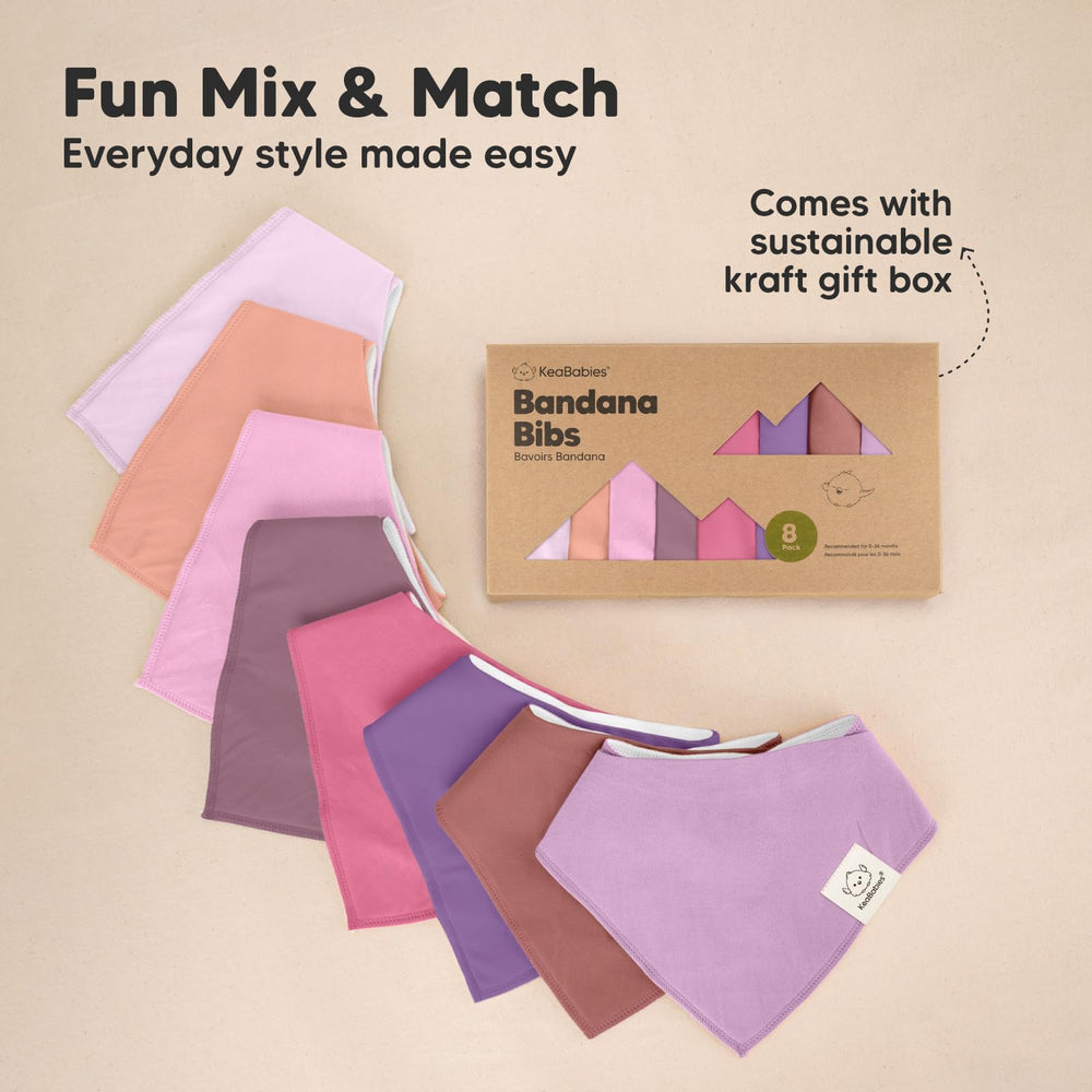 KeaBabies lilac bibs on a baby’s chest, highlighting comfortable fit and drool absorption.