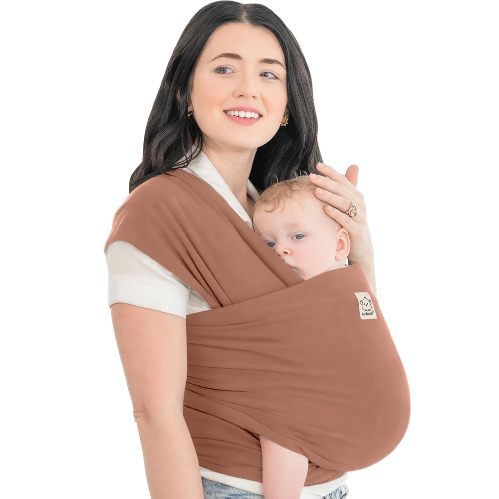 KeaBabies Baby Wrap Carrier Terracotta front wearing shows ergonomic support for caregiver and baby.