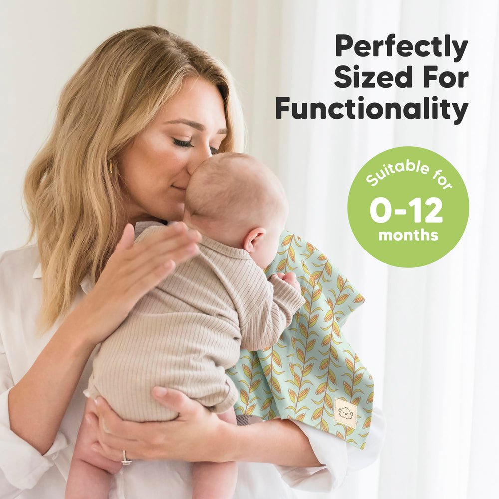 KeaBabies burp cloths travel-ready scene demonstrates compact fold and diaper bag fit.