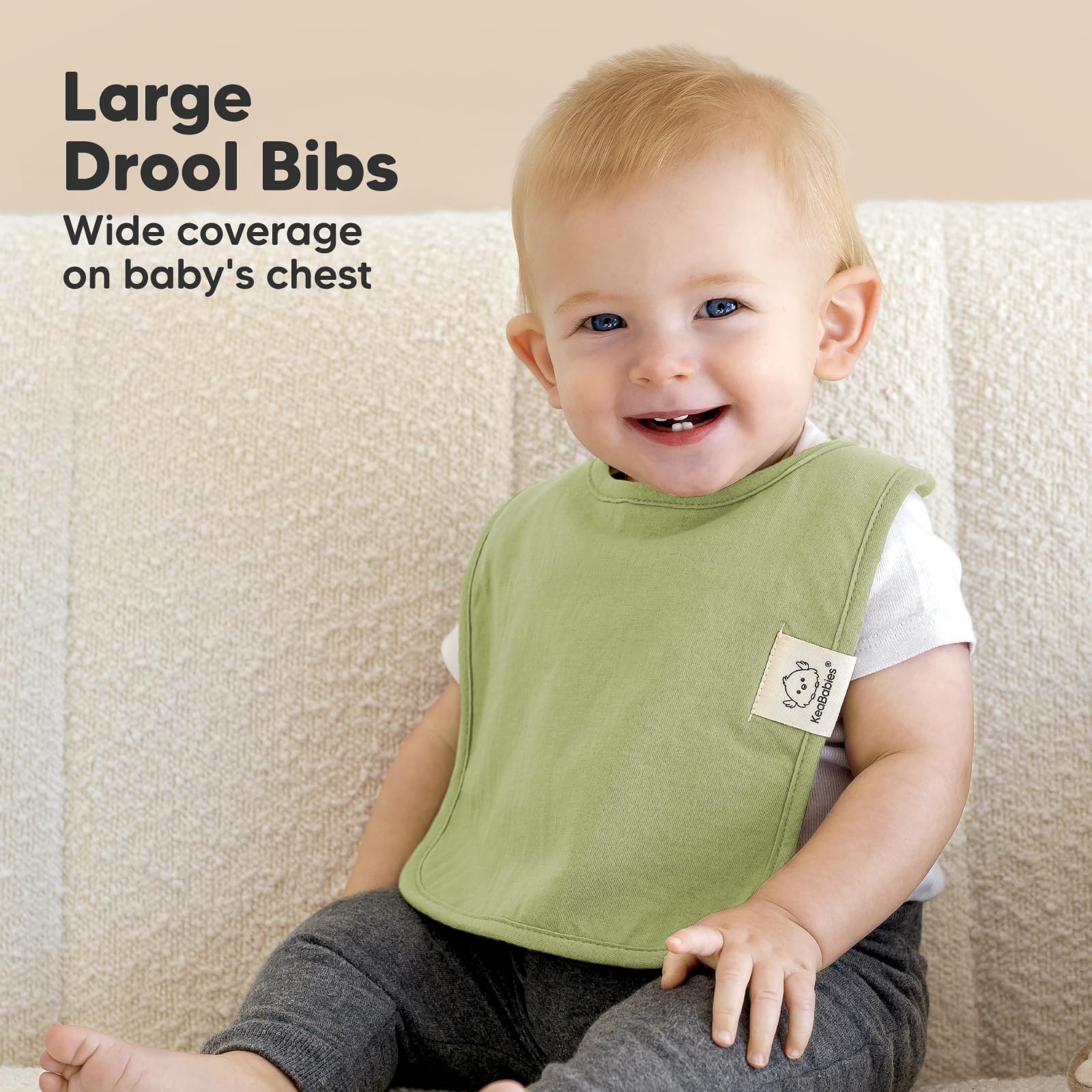 KeaBabies Coast bib with water-resistant back protecting clothes.