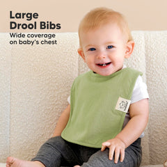 KeaBabies Coast bib with water-resistant back protecting clothes.
