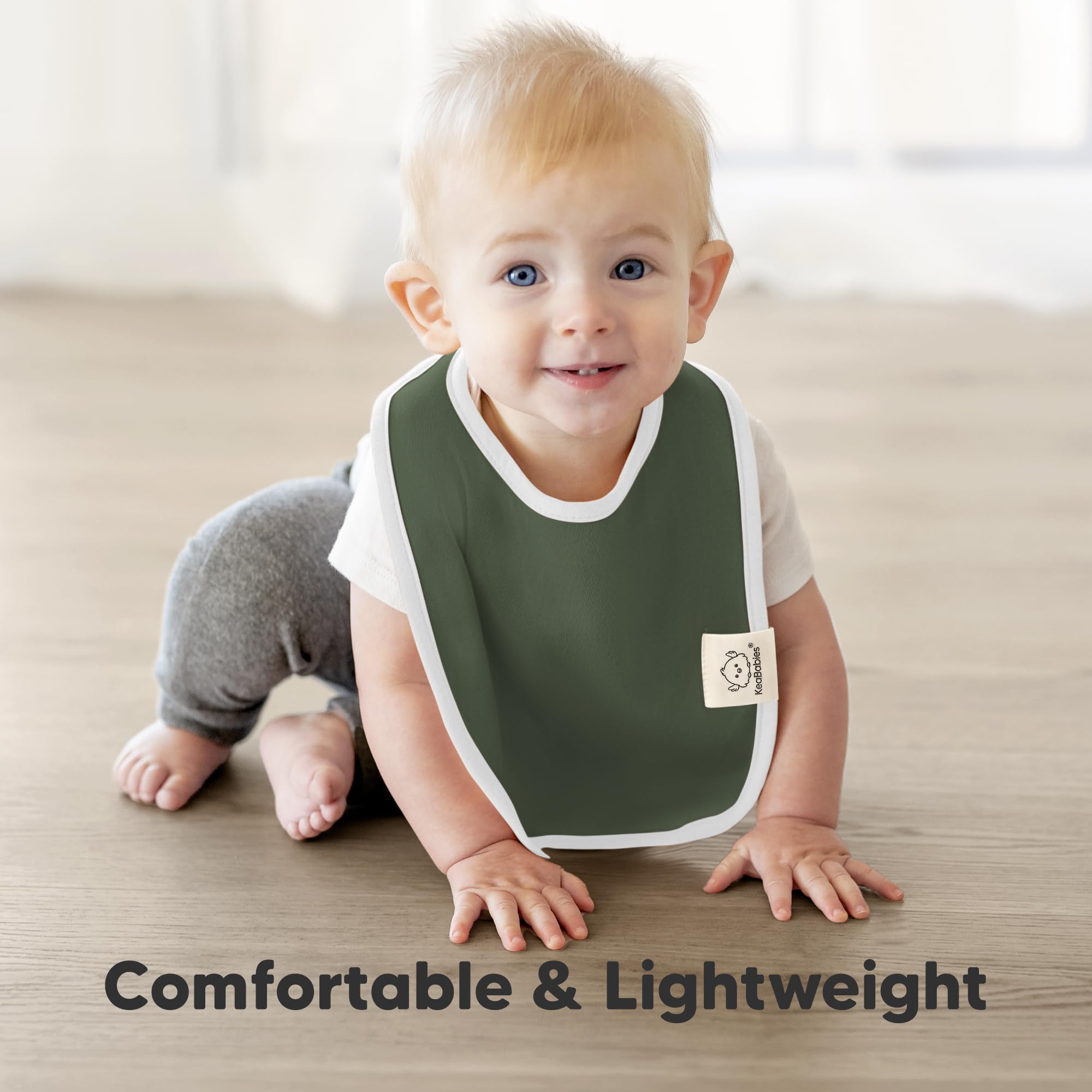 KeaBabies Coast bibs spread to show large chest coverage for mess management