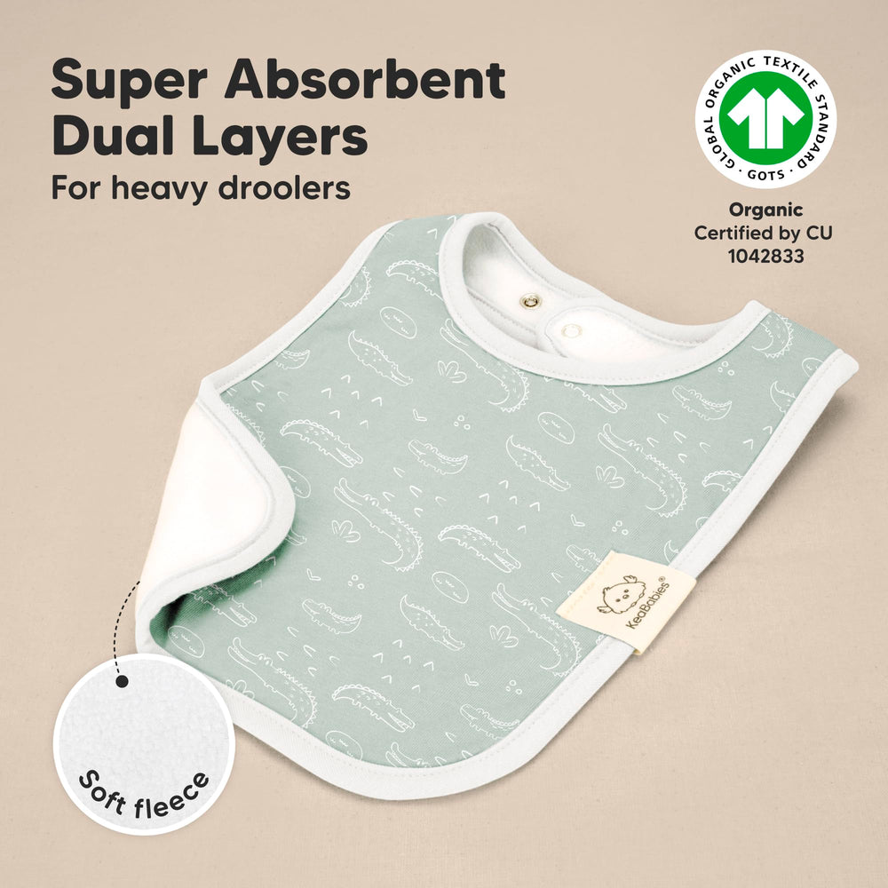 KeaBabies Coast Bib worn on baby offers chest coverage for drool days.