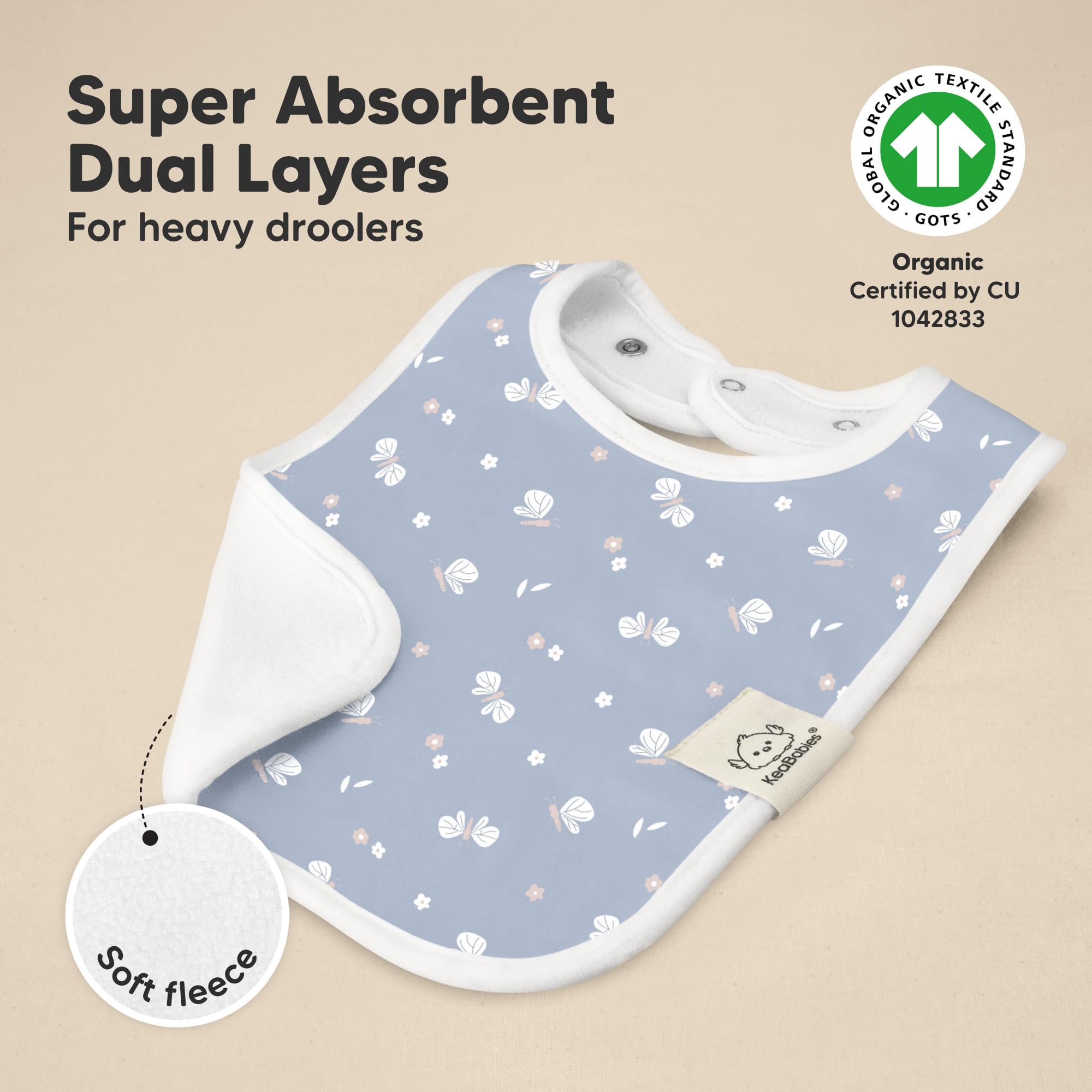KeaBabies Coast bib on baby demonstrates extended chest coverage.