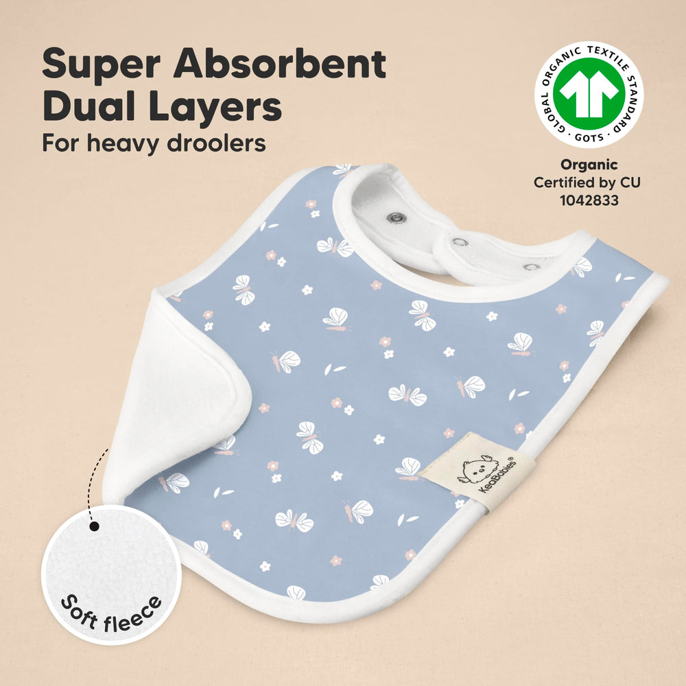 KeaBabies Coast bib on baby demonstrates extended chest coverage.