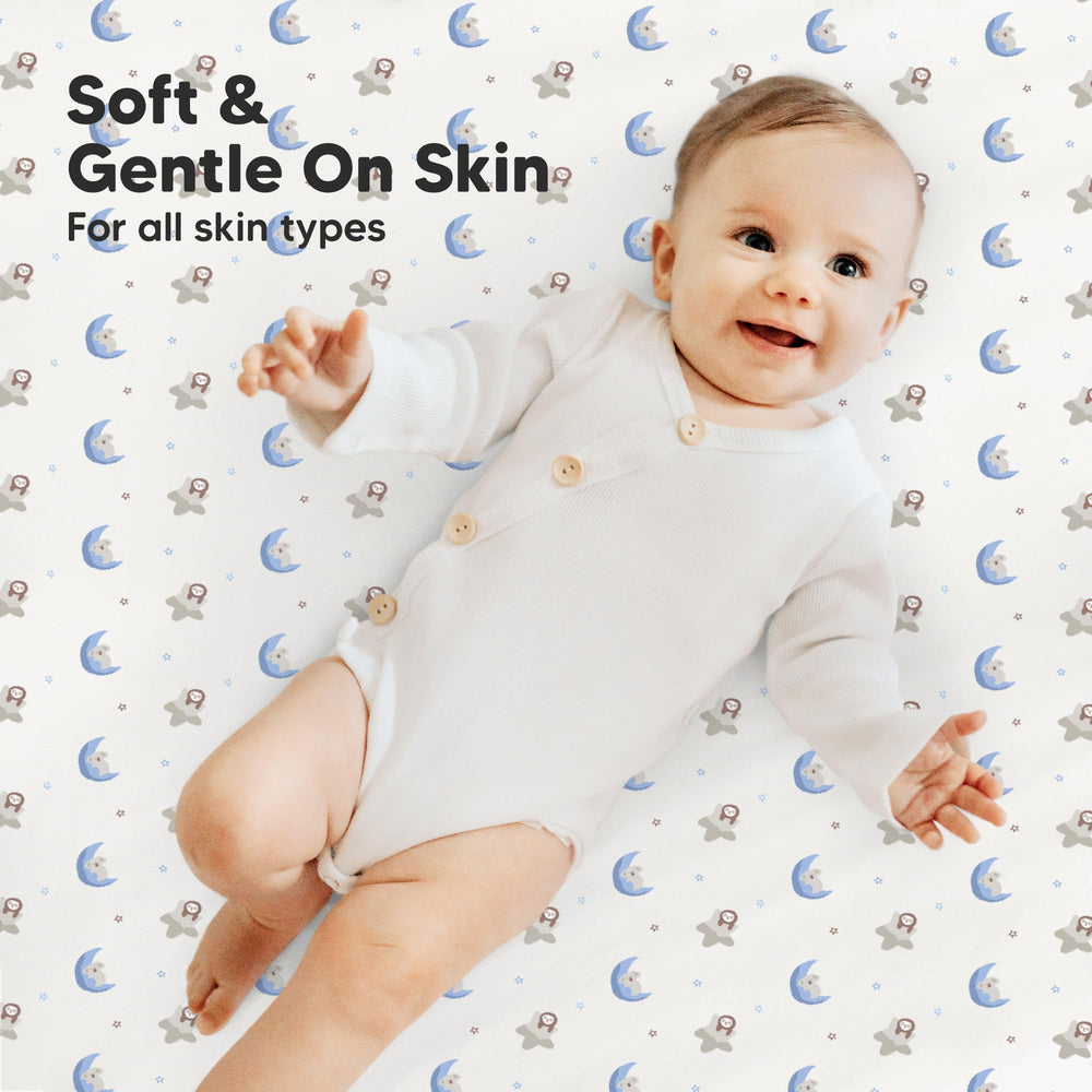 KeaBabies Cosmo mini crib sheets show a hidden elastic band for secure fit.