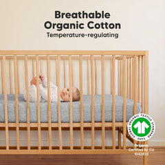 KeaBabies cloud-print crib sheets on mattress showcasing secure fit and cozy texture.