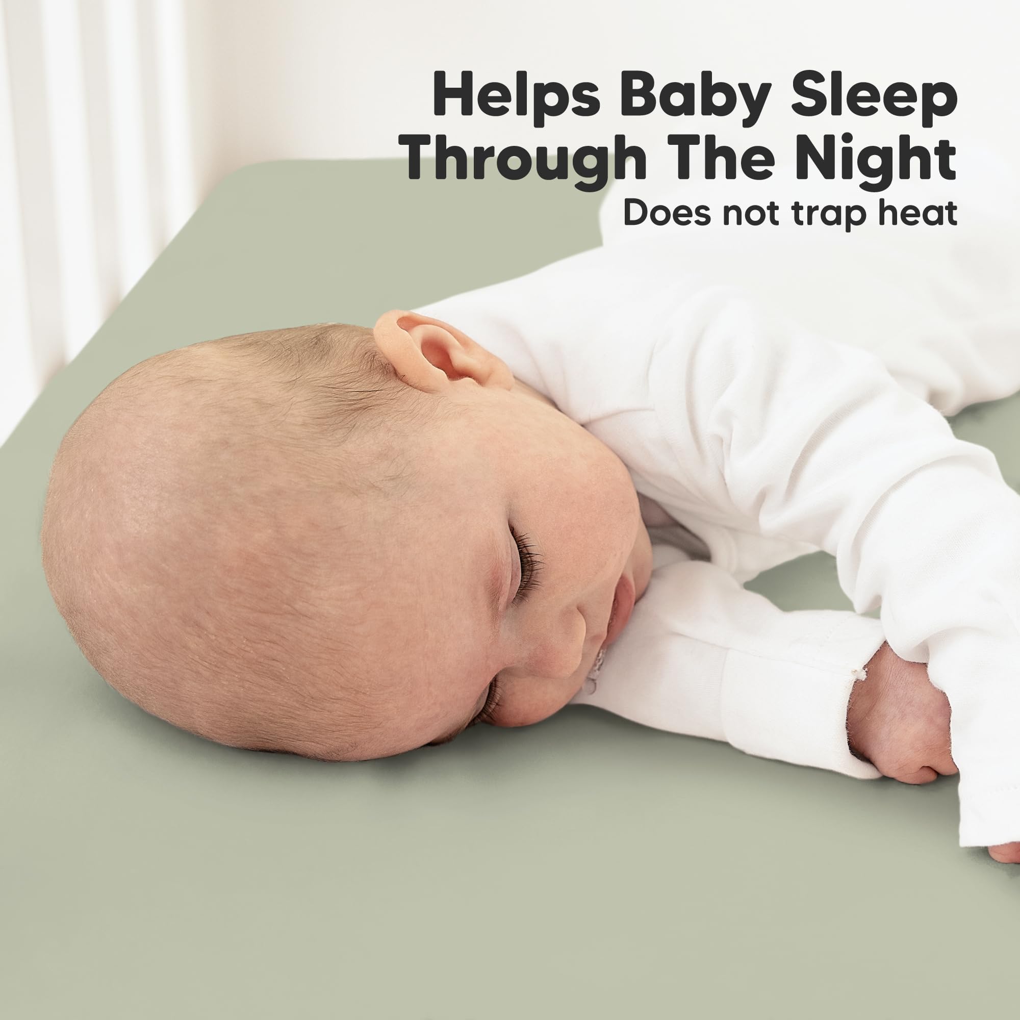 KeaBabies sheets on crib mattress during nap time suggest cozy, uninterrupted rest.