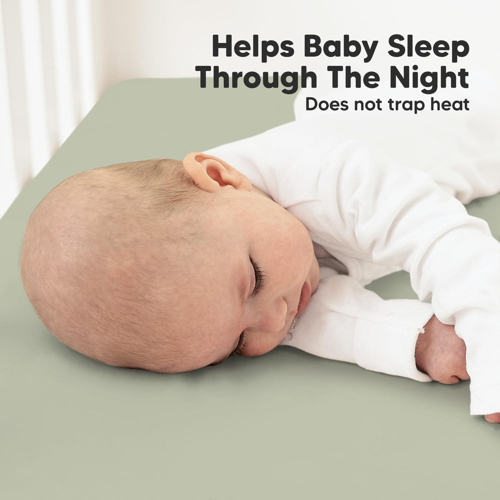 KeaBabies sheets on crib mattress during nap time suggest cozy, uninterrupted rest.