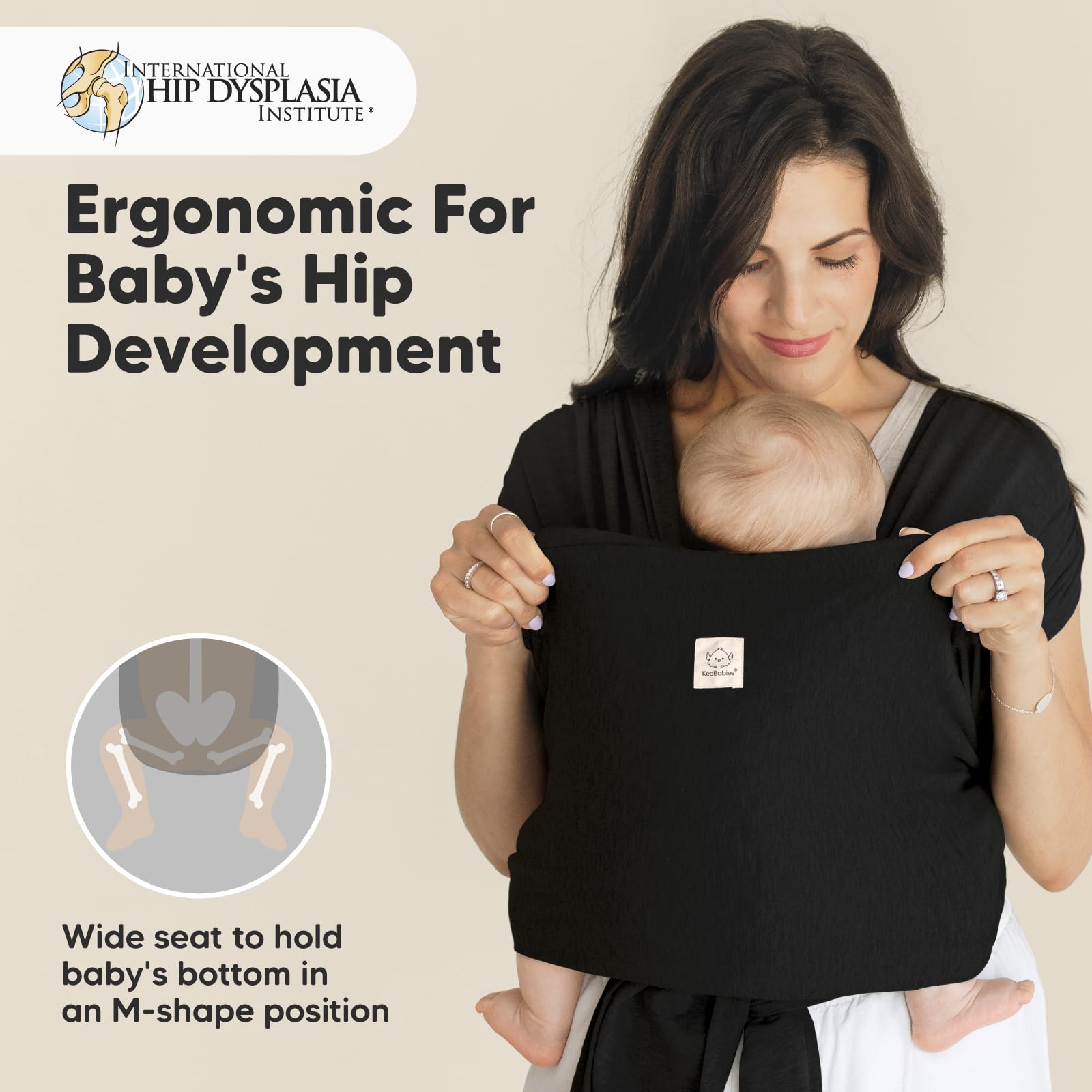 KeaBabies D-Lite wrap demonstrates newborn to toddler weight range in use.
