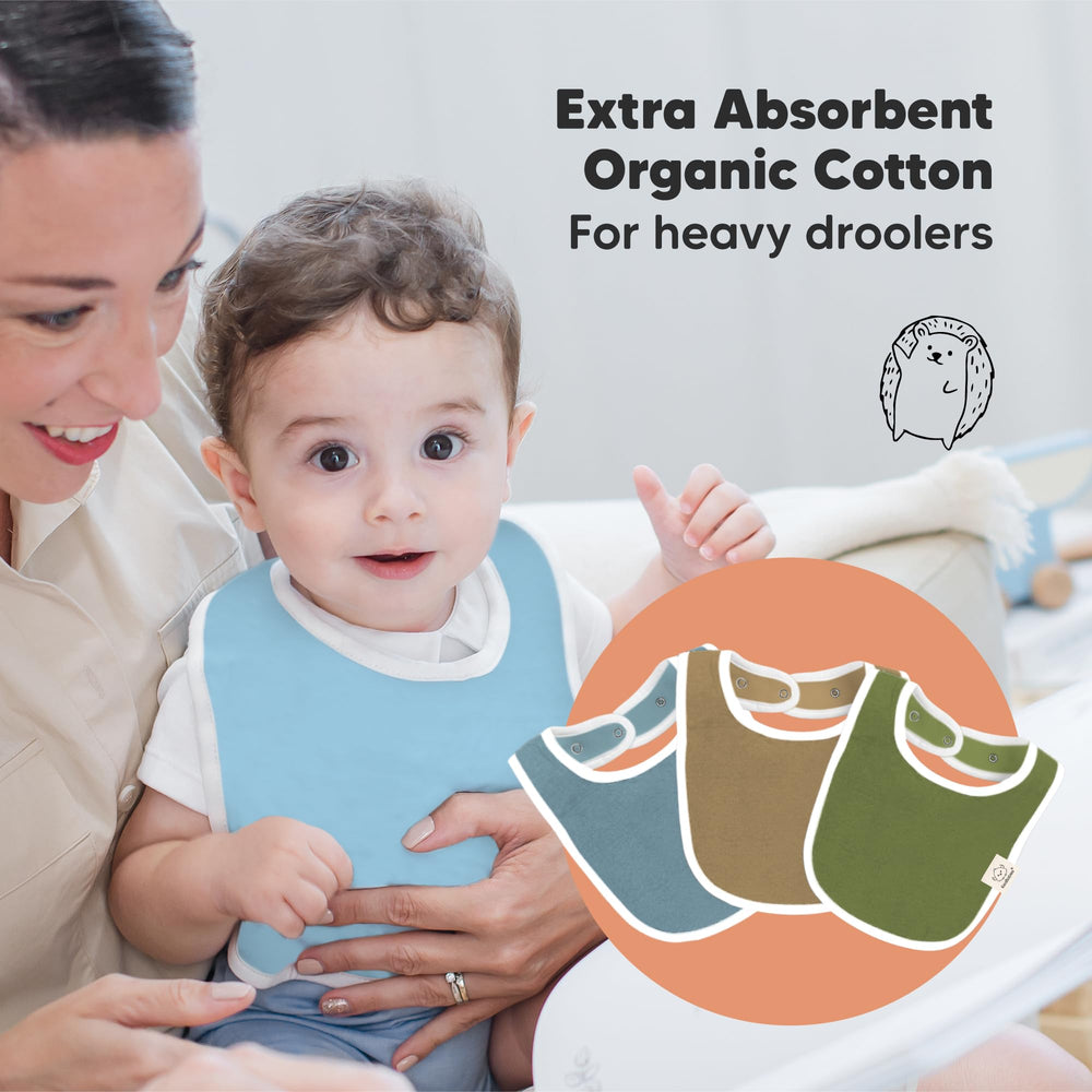 KeaBabies Daybreak bibs on baby chest providing full coverage and flat profile