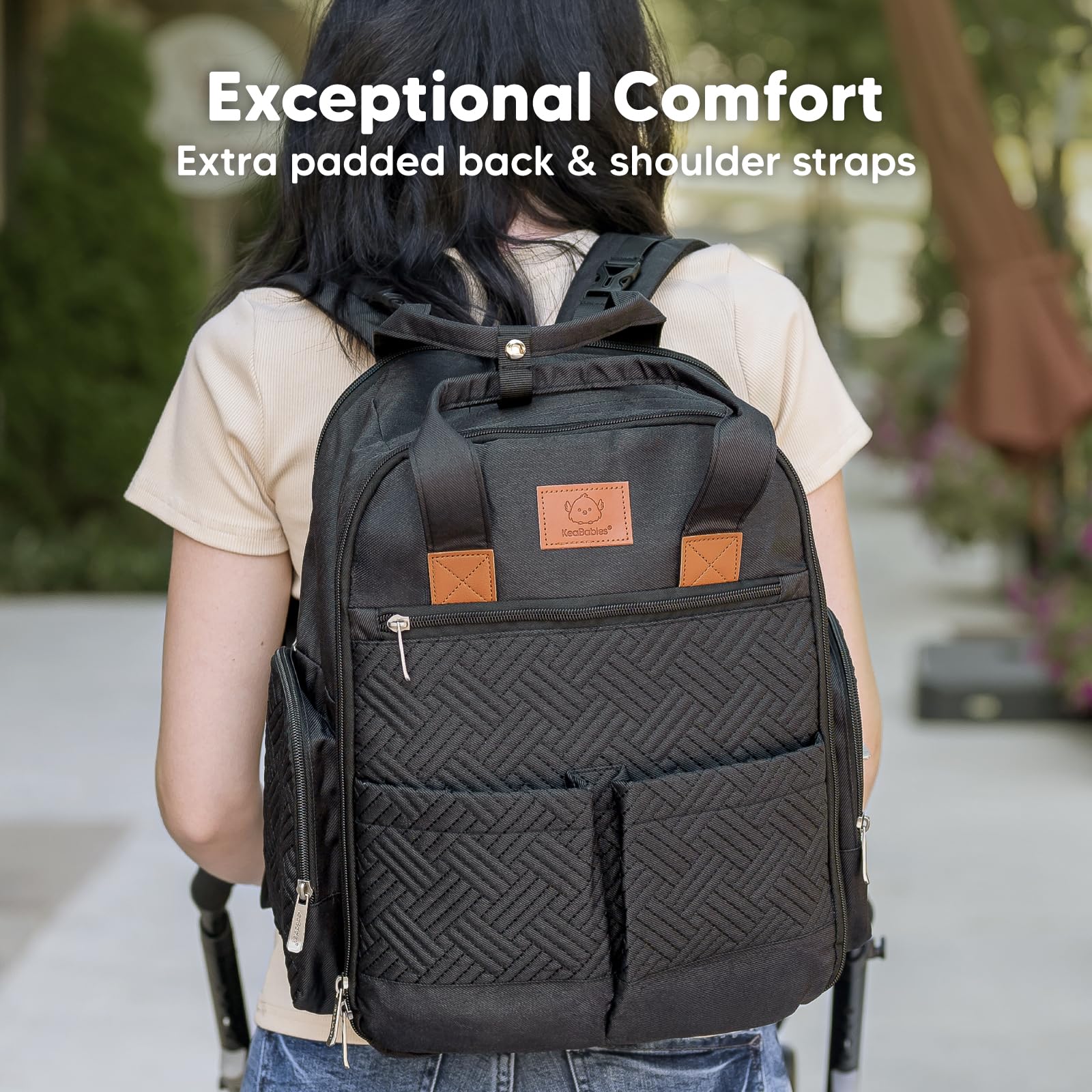 KeaBabies Diaper Bag Charcoal stroller clip demonstrates hands-free versatility