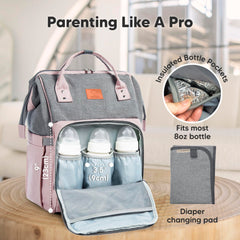 KeaBabies diaper bag backpack supports hands-free travel when using a baby carrier.