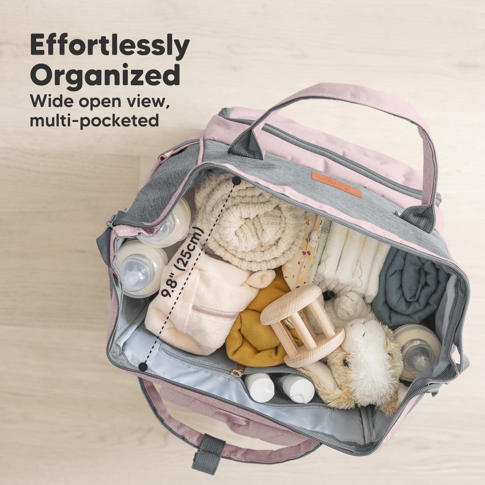 KeaBabies diaper bag backpack with multiple pockets for quick diapering and essentials.