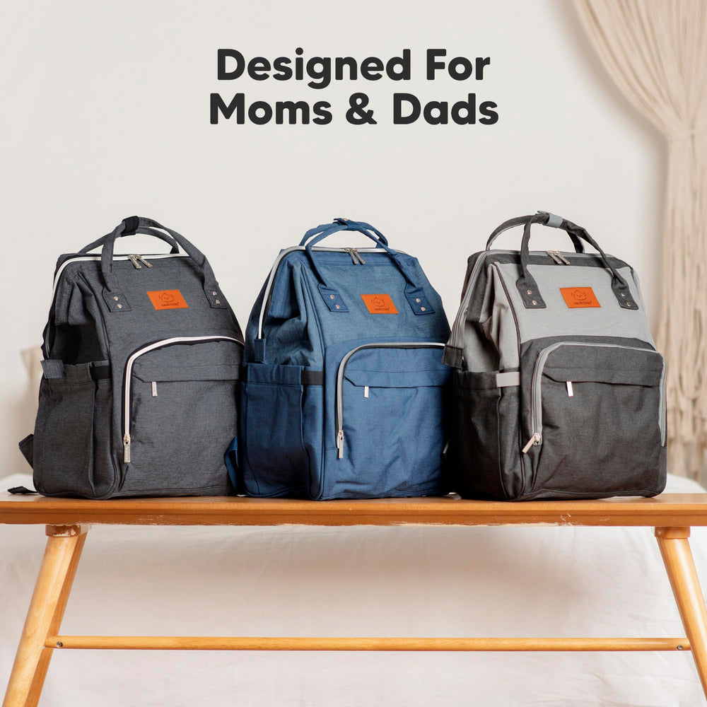 KeaBabies black travel diaper bag complements outfits during trips.