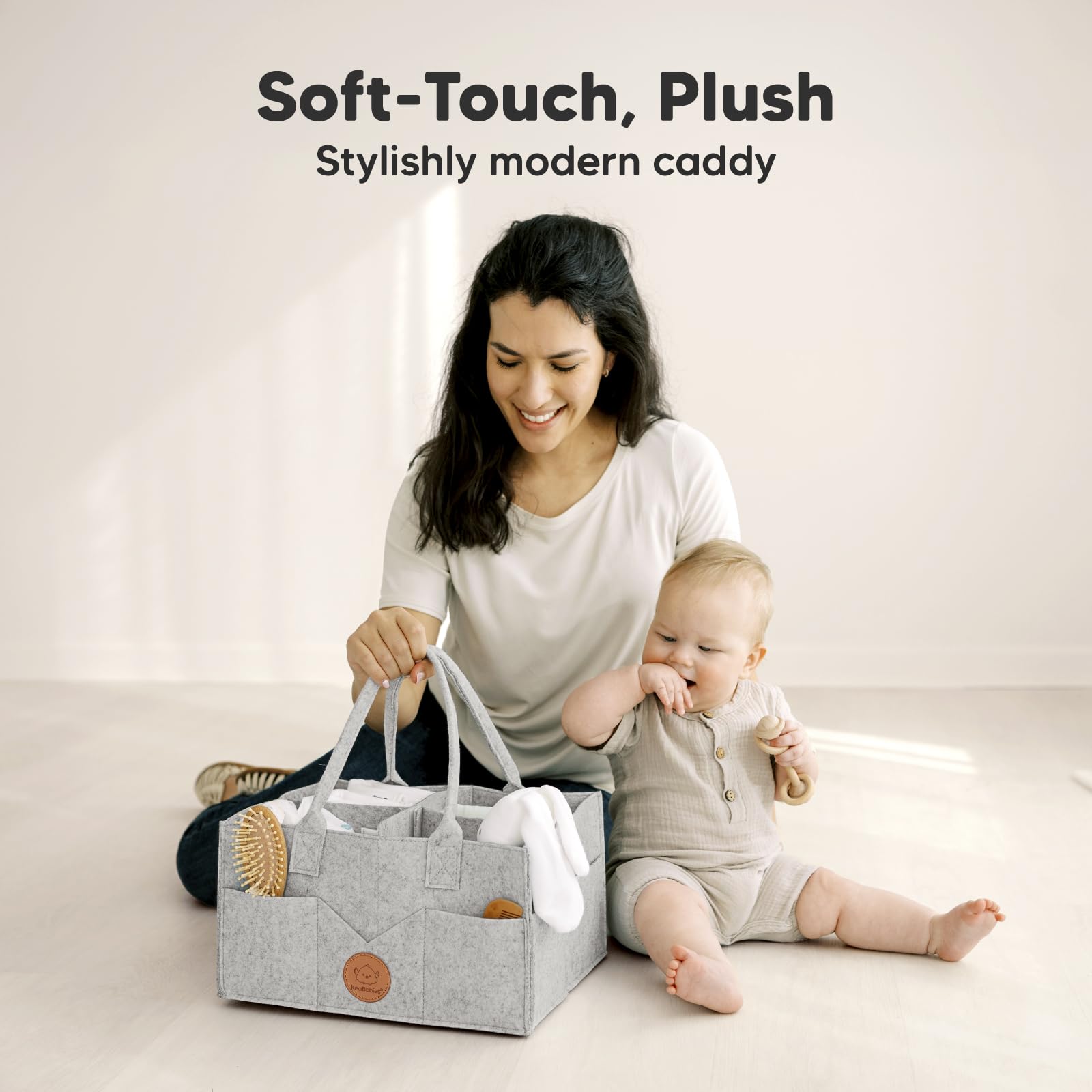 KeaBabies diaper caddy handle closeup highlighting easy grab-and-go portability.