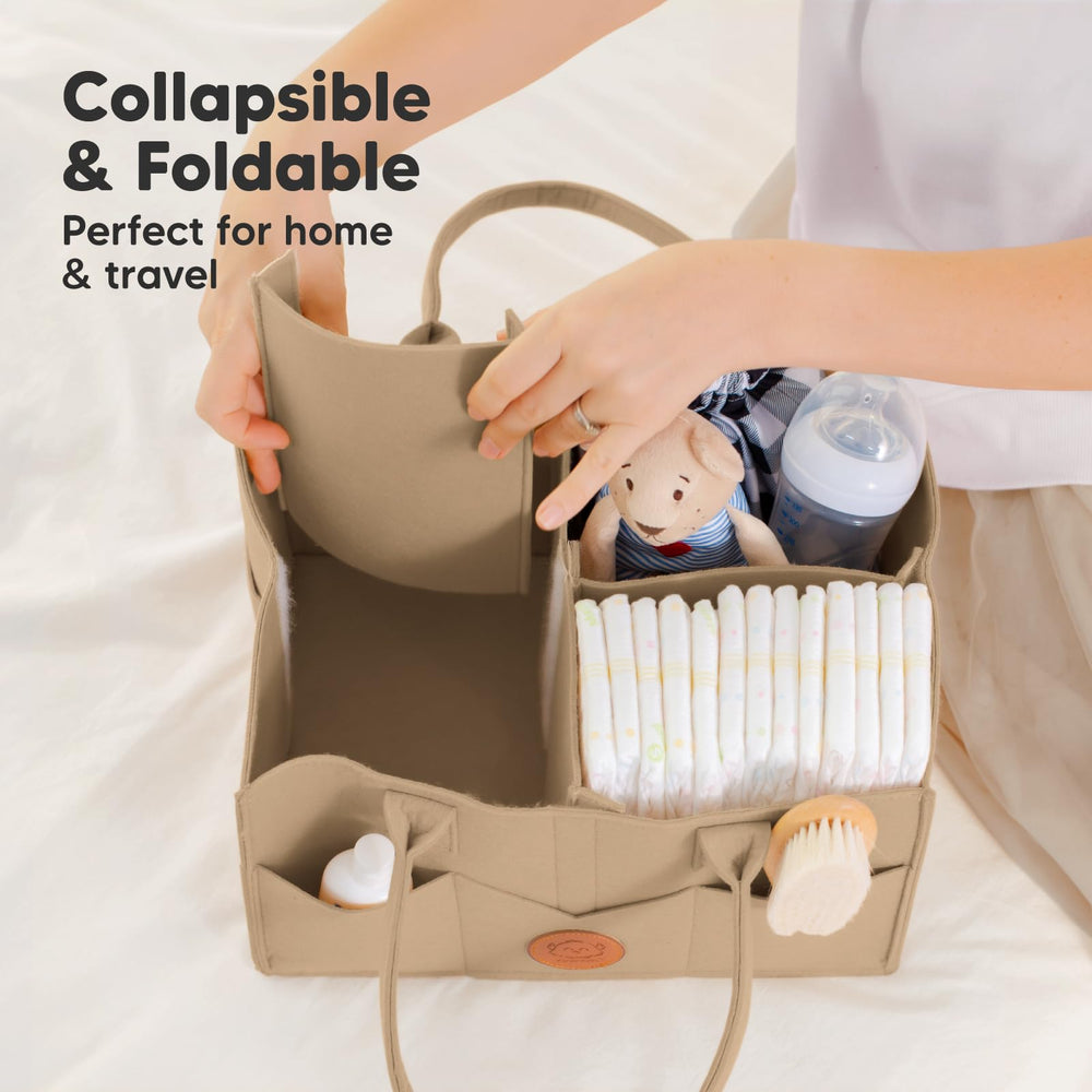 KeaBabies diaper caddy side pockets holding wipes and nappies for easy reach.
