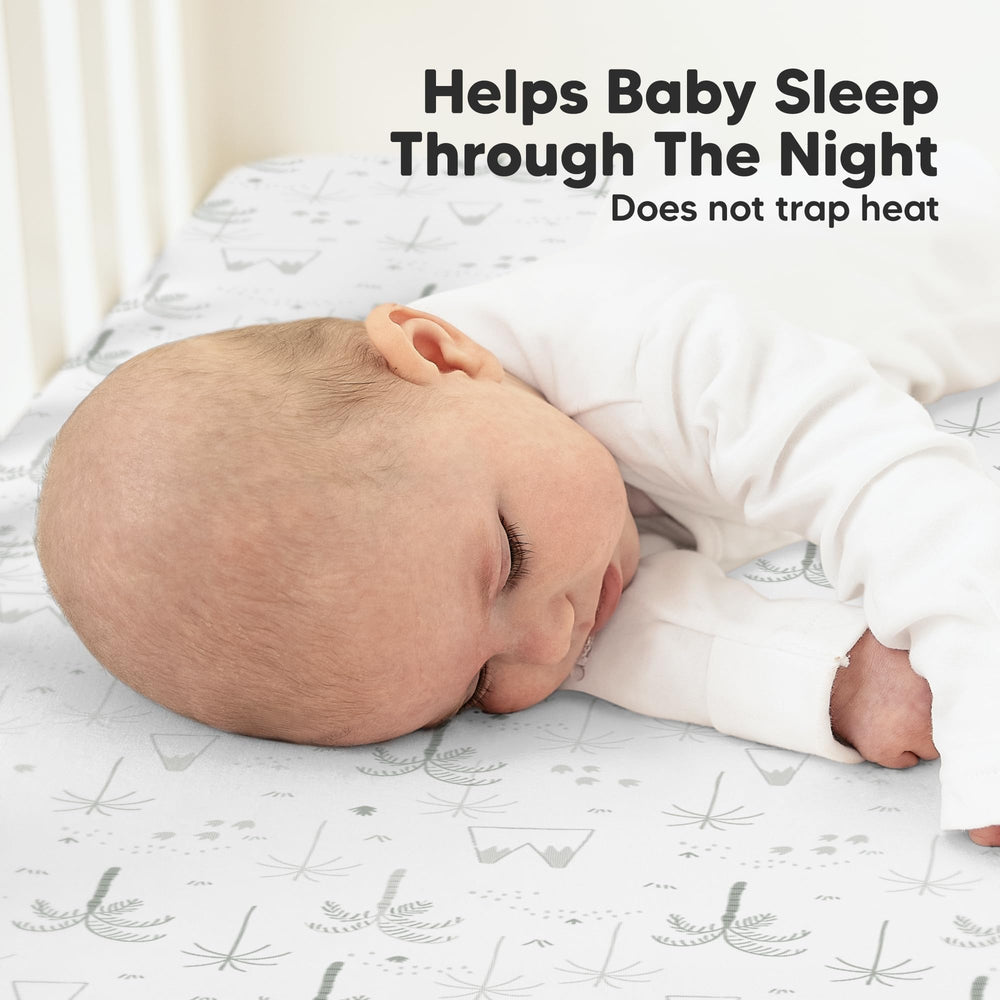 KeaBabies DinoDood prints on neutral sheets suit any nursery decor