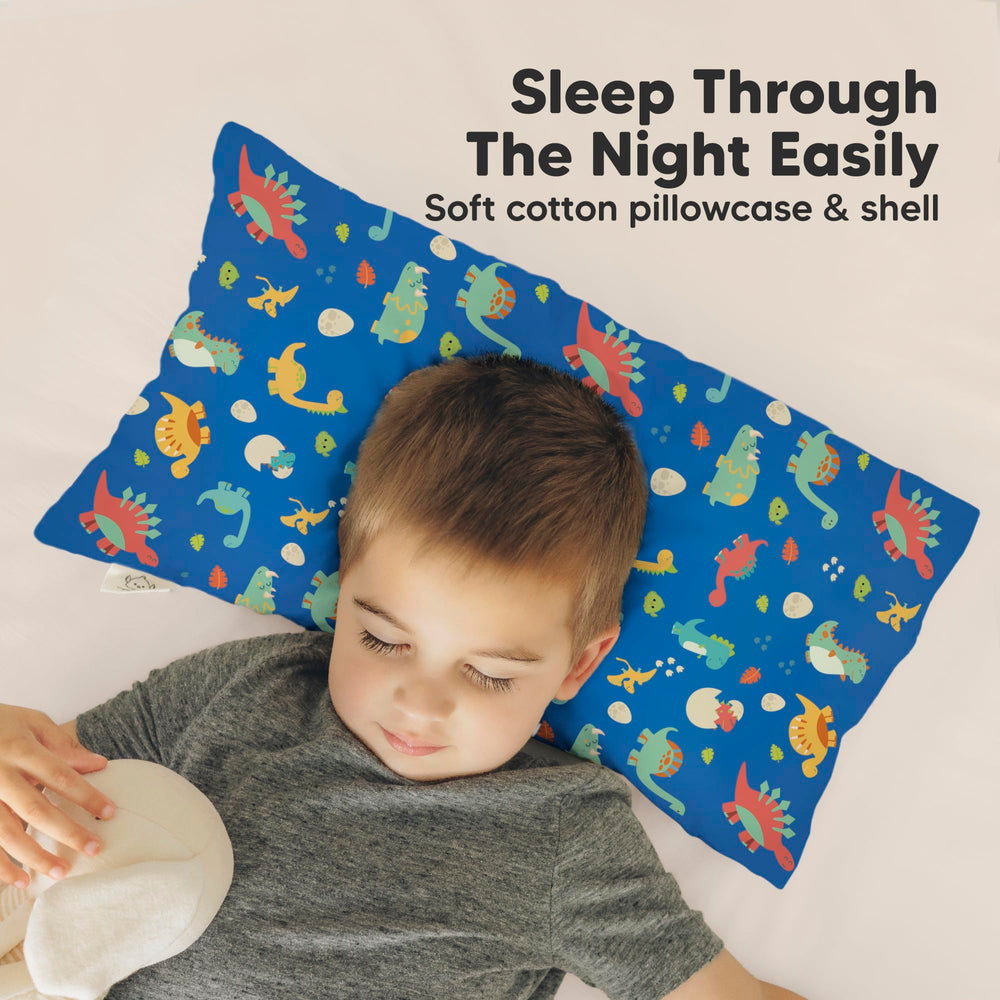 KeaBabies Dinoworld pillow in toddler bed demonstrates small size ideal for preschool naps.