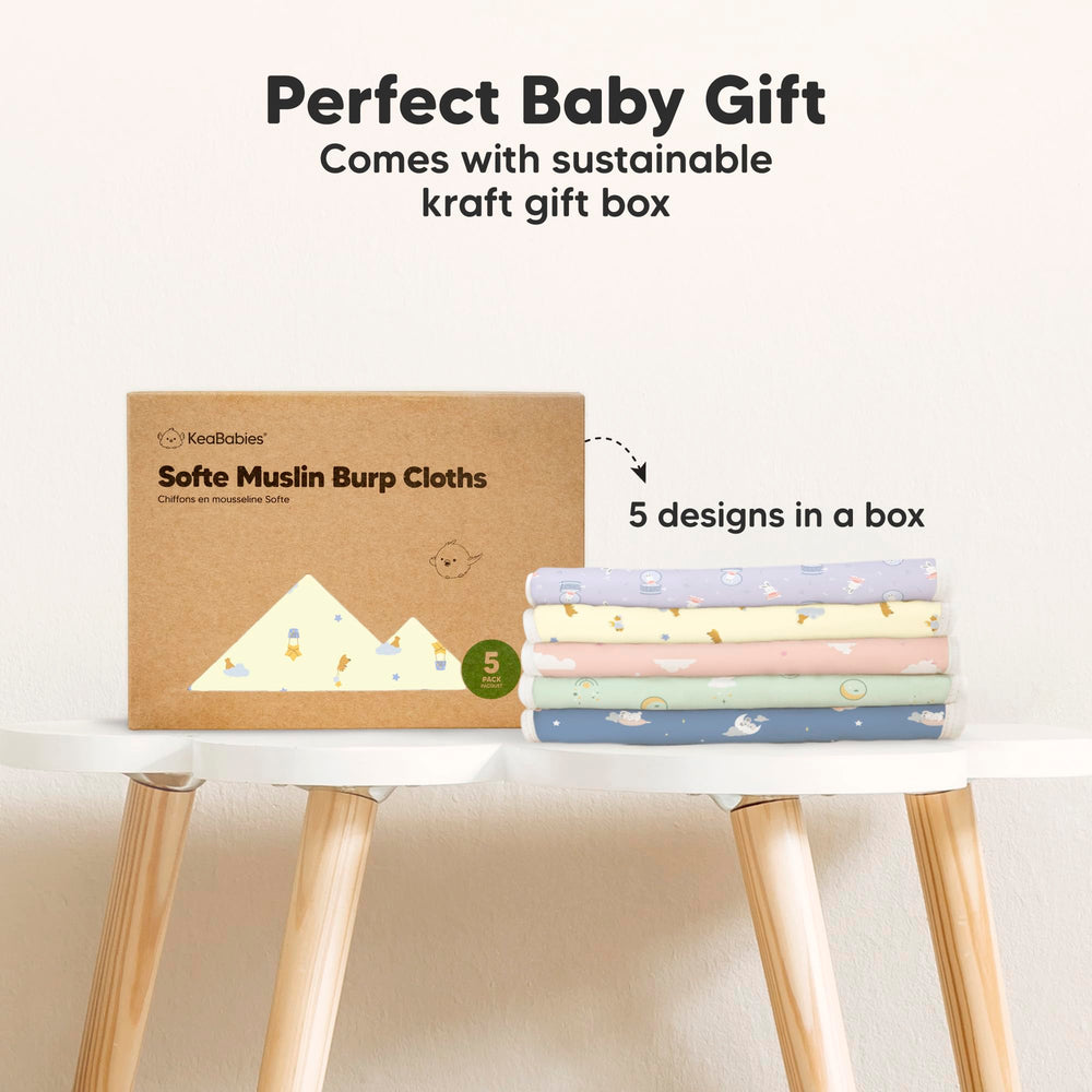 KeaBabies Dreamers burp cloth in use for mess-control on the go.