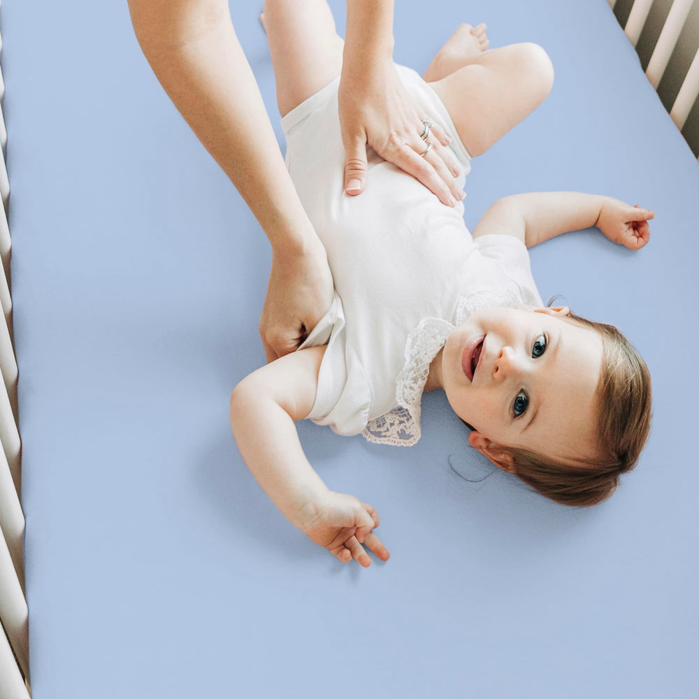 KeaBabies durable stitching on the crib sheet edge for long-lasting use.