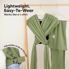 KeaBabies dusty olive wrap worn by parent in hands-free bonding setup