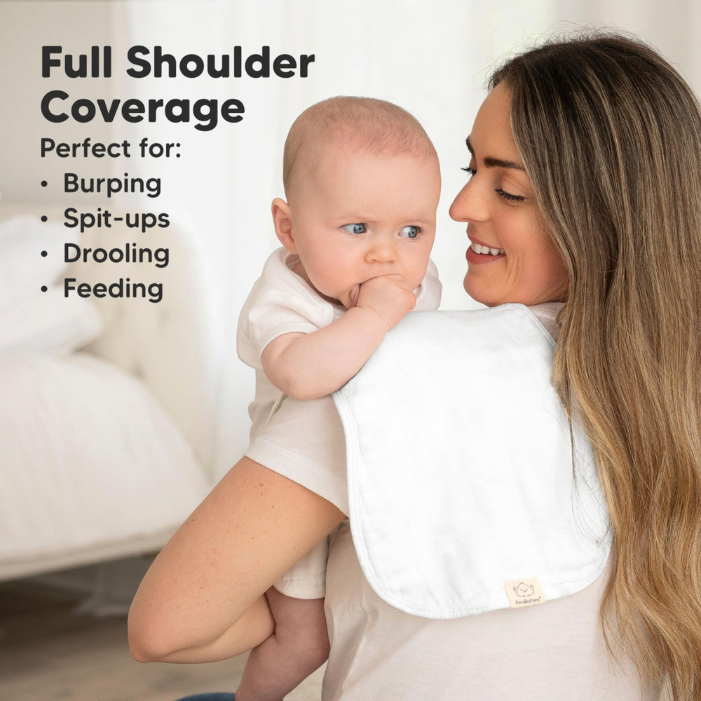 KeaBabies figure-8 shoulder coverage burp cloth fits securely during feeding.