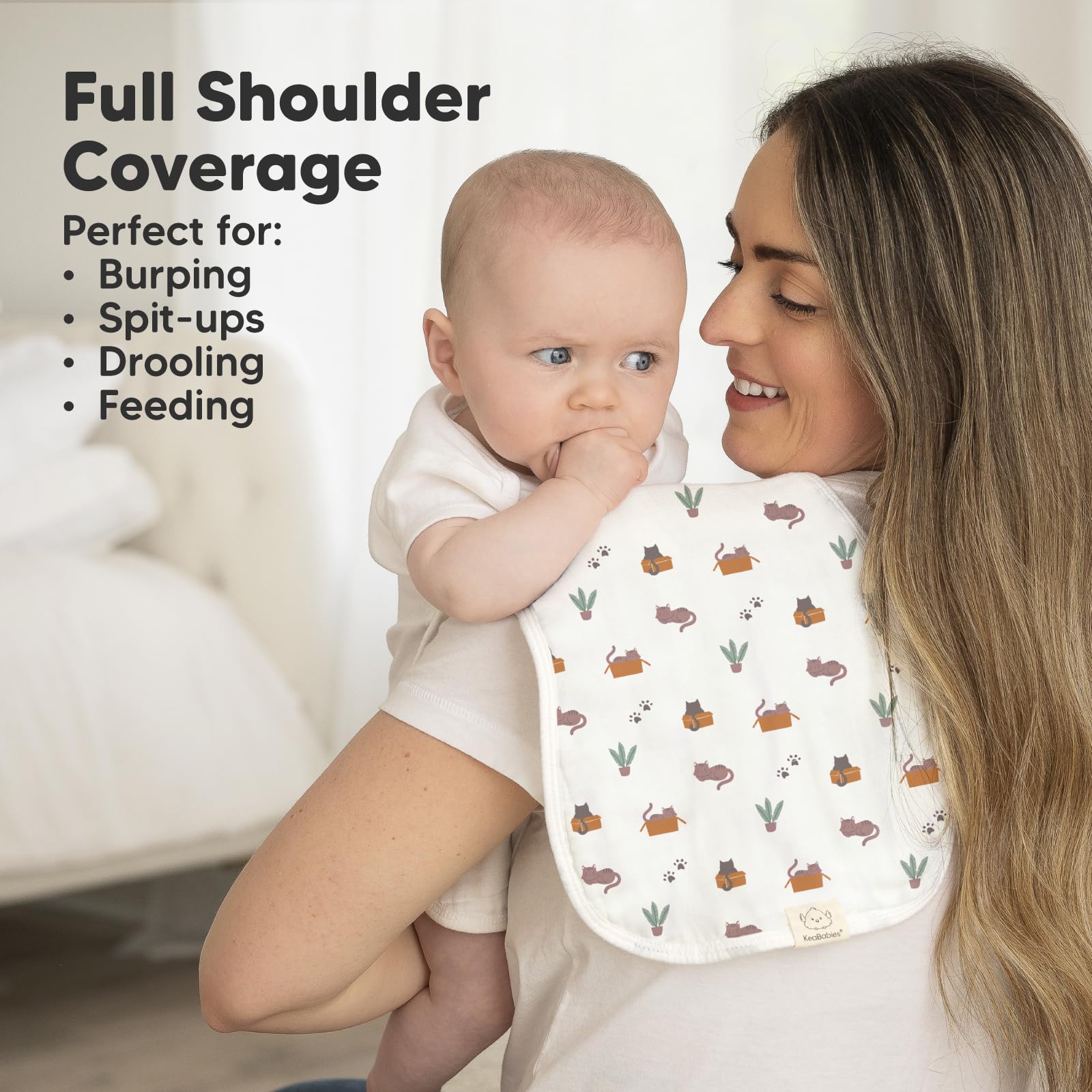 KeaBabies figure-8 design burp cloth provides secure shoulder coverage to prevent slipping.
