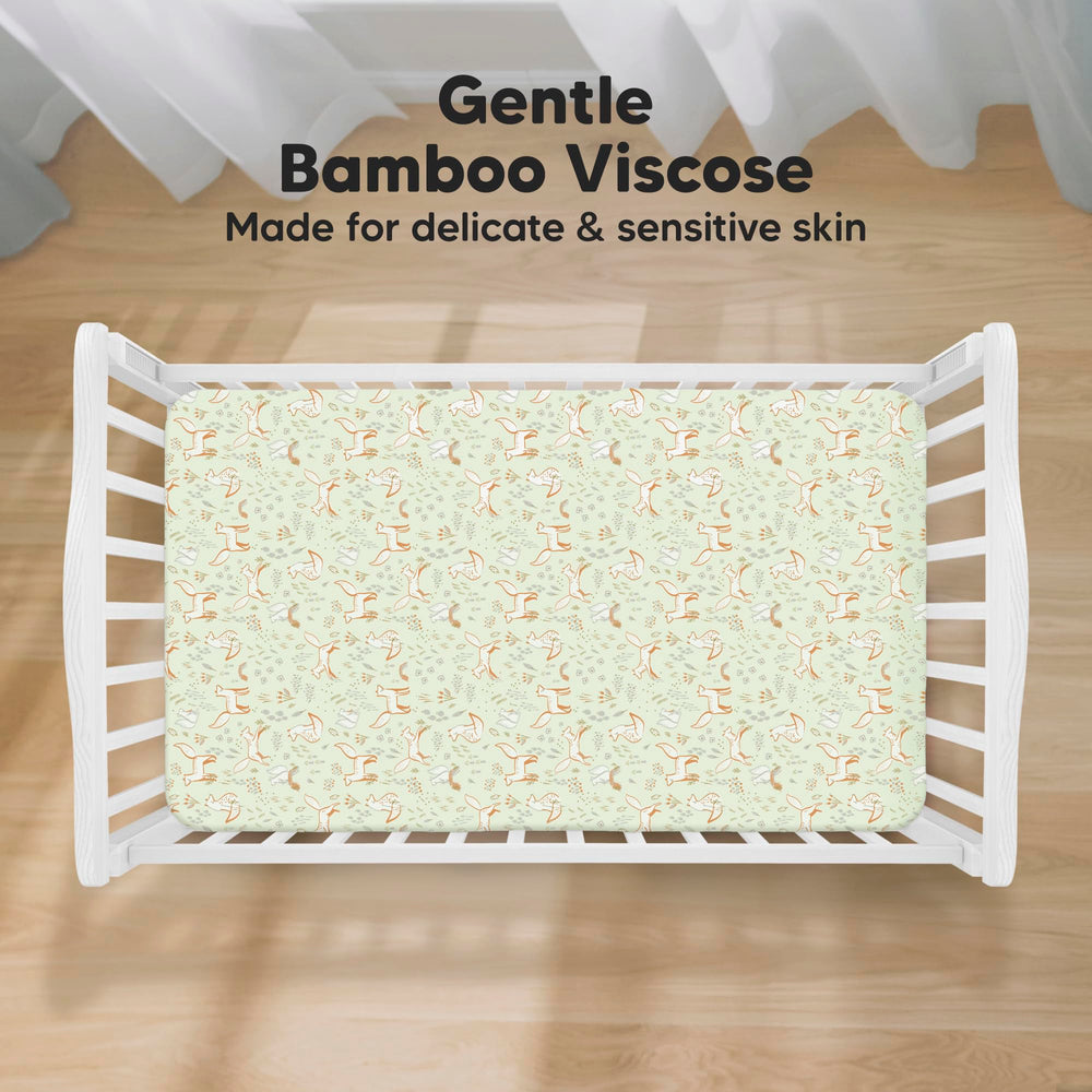 KeaBabies Foxtrot crib sheet on mattress demonstrates 52x28 fit and secure feel