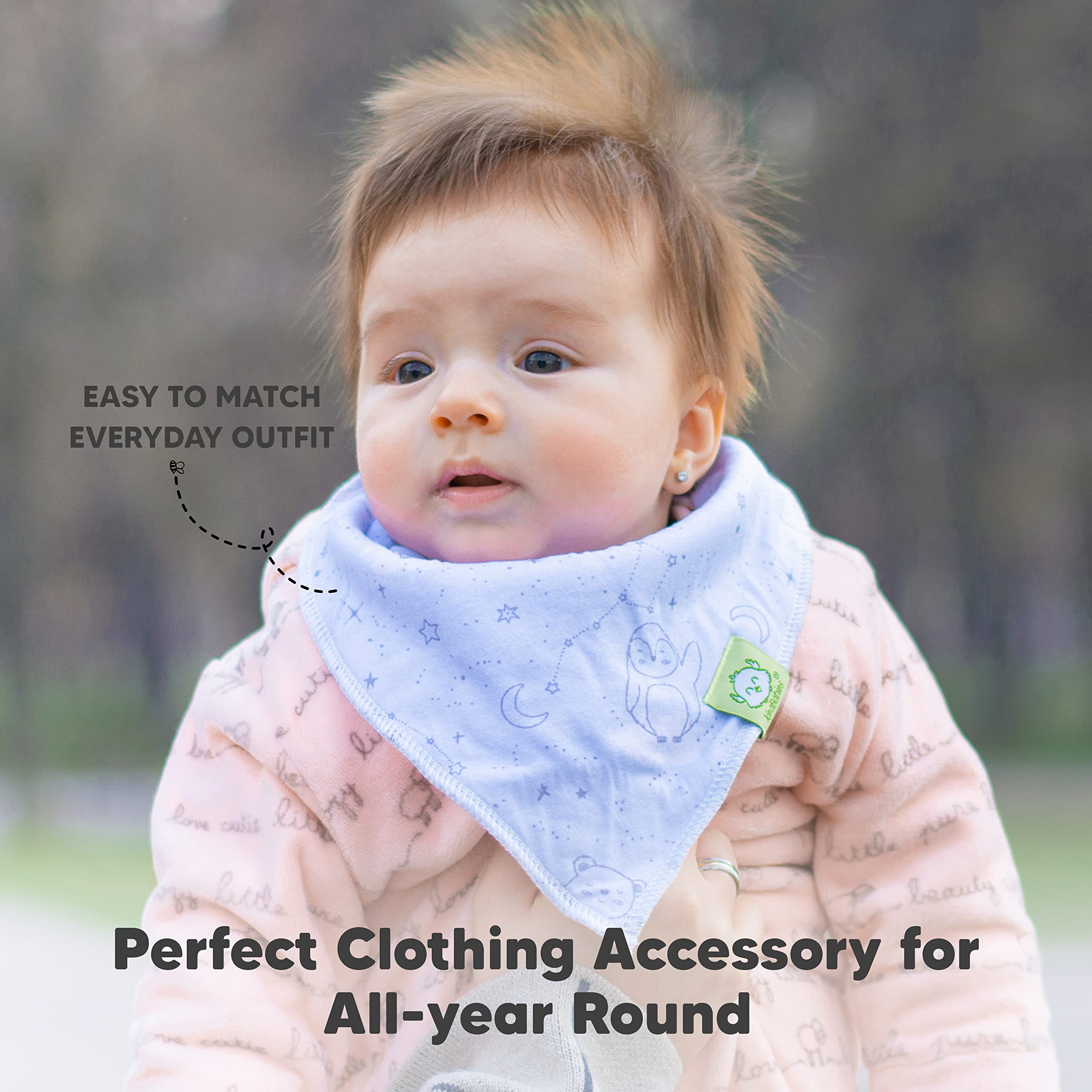 Gender-neutral KeaBabies constellation bibs matching daily outfits