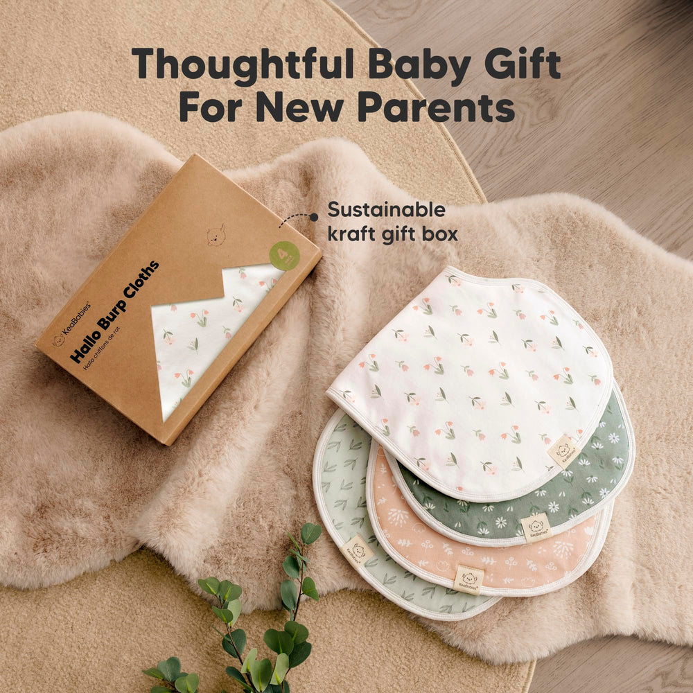 KeaBabies gender-neutral burp cloths blending with baby outfits