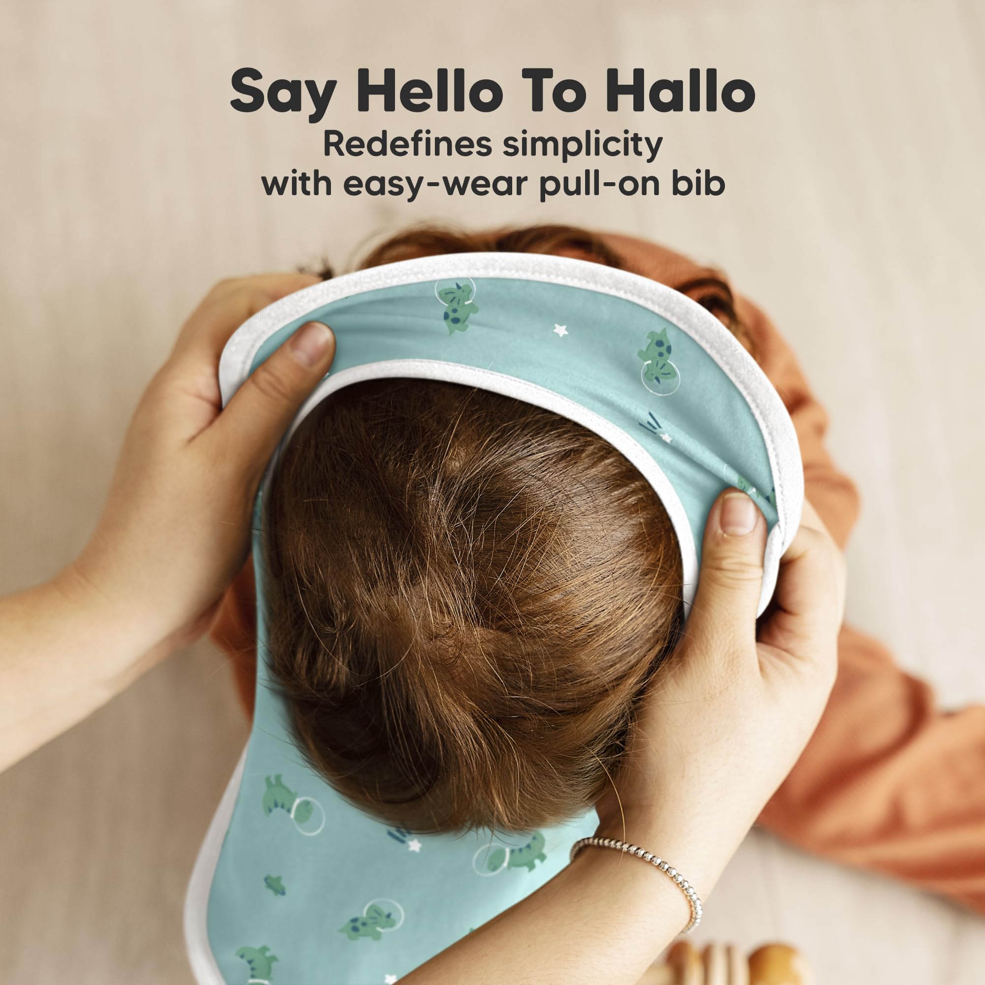 KeaBabies Hallo bib lap-shoulder pullover stays on during active play.