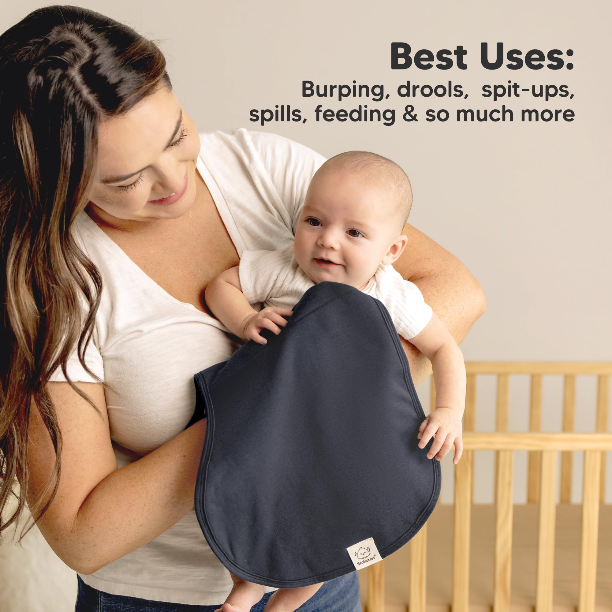 KeaBabies Hallo burp cloth on shoulder demonstrates broad coverage.