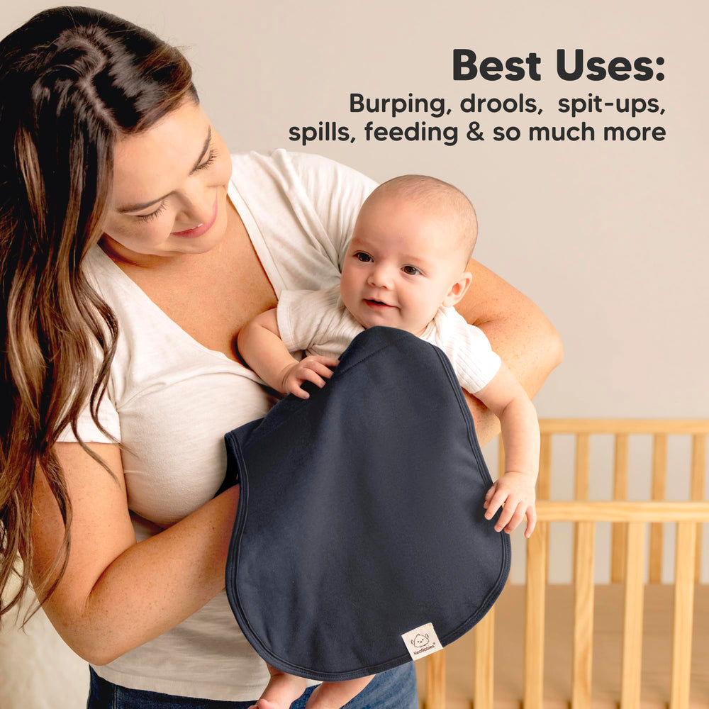 KeaBabies Hallo burp cloth on shoulder demonstrates broad coverage.