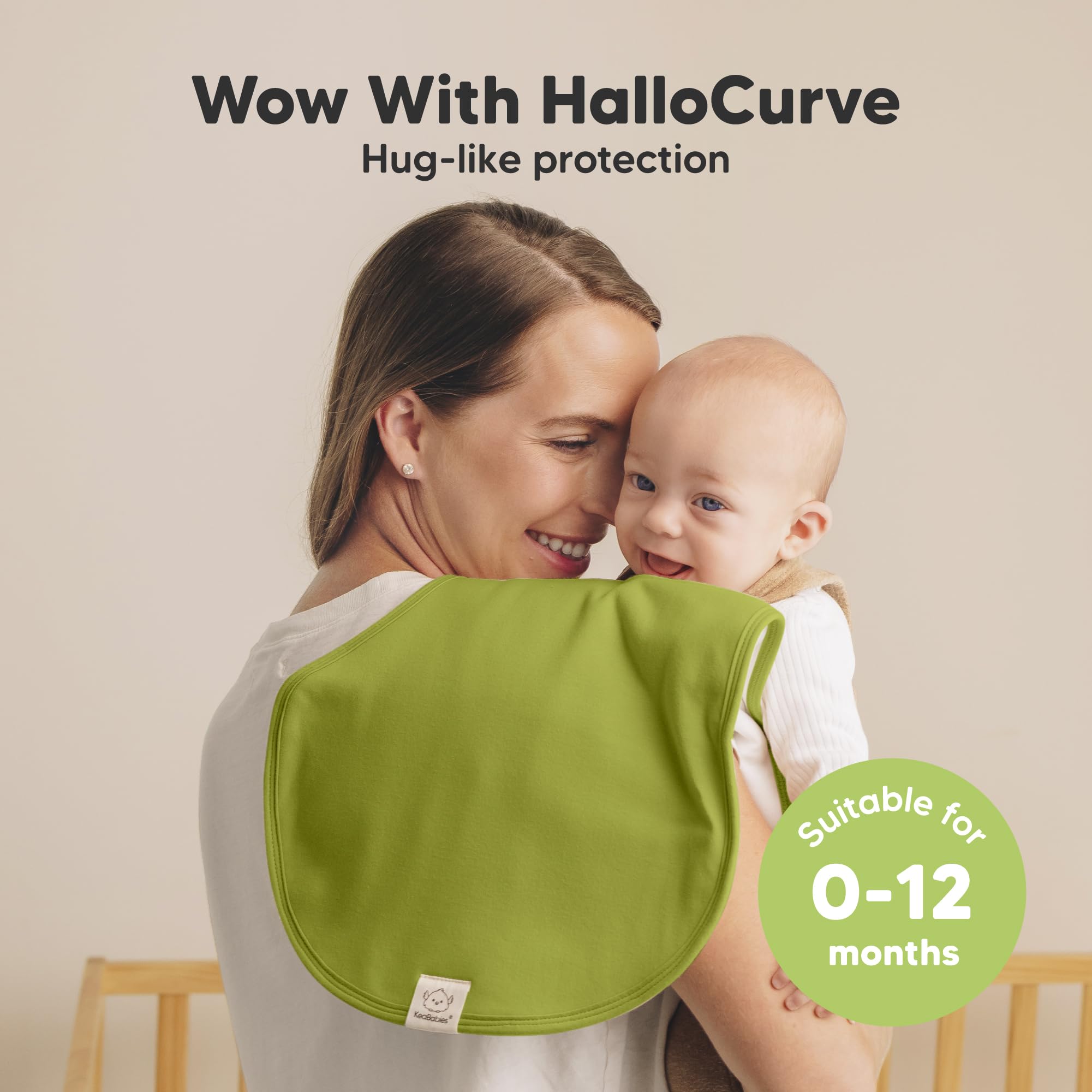 KeaBabies Hallo burp cloth on shoulder demonstrates full coverage with the Hallo Curve design.