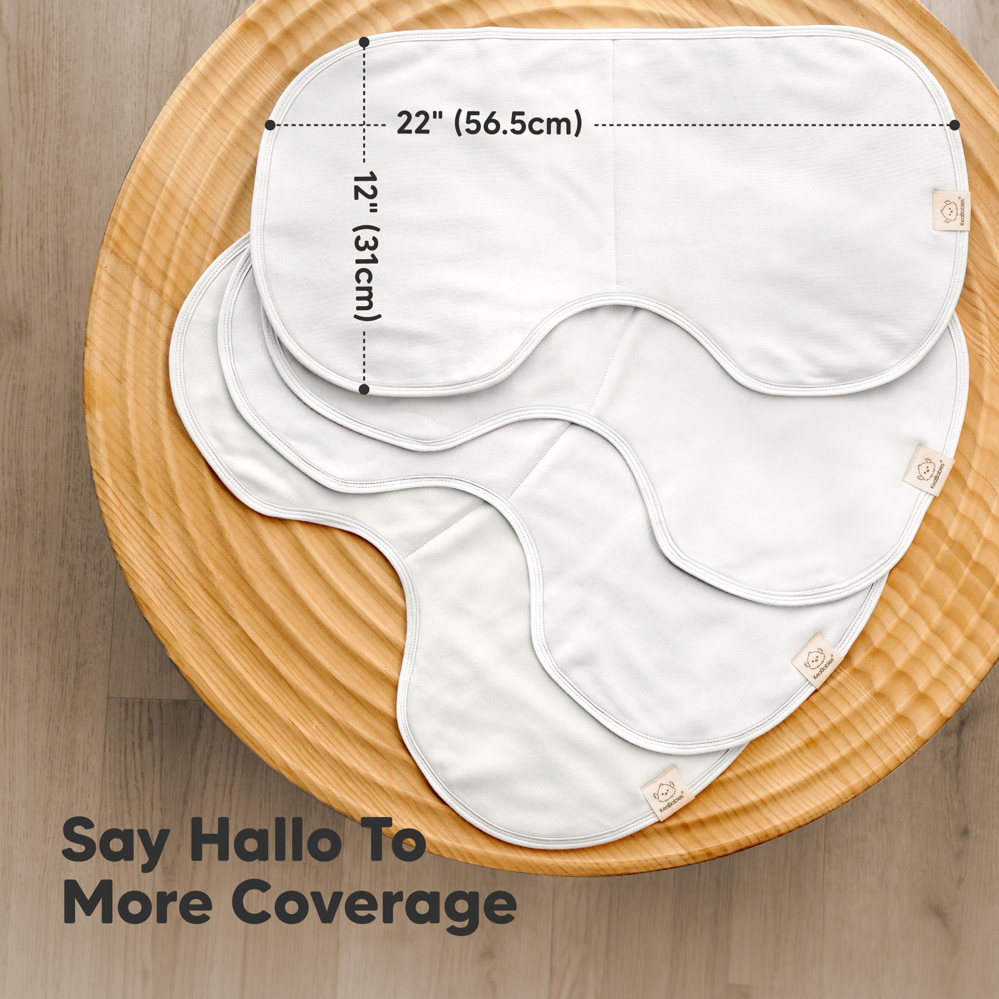 KeaBabies Hallo Burp Cloths laid flat show extra-large coverage for shoulder protection.