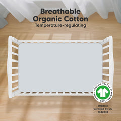 KeaBabies hazy print crib sheet on standard mattress showcasing snugfit stretch.
