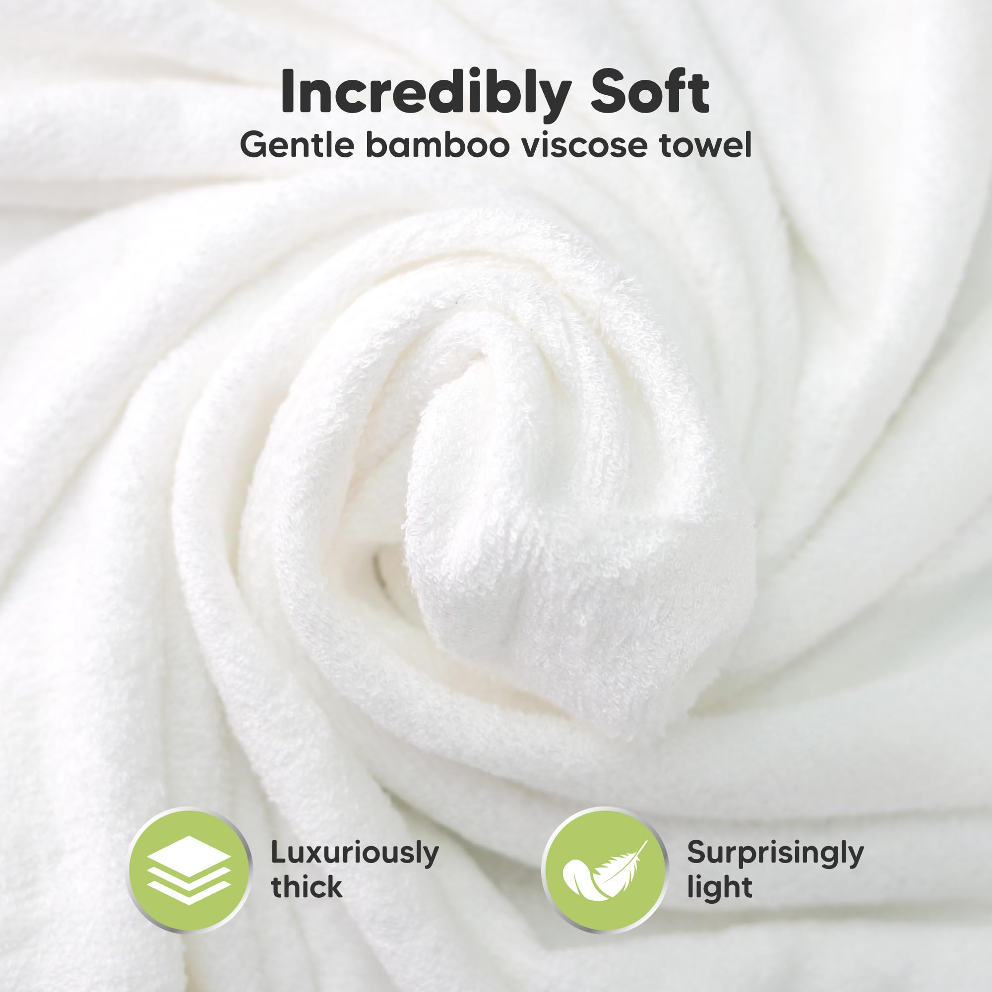 KeaBabies hooded towel baby-holding image highlights extra-large size for growing toddlers.