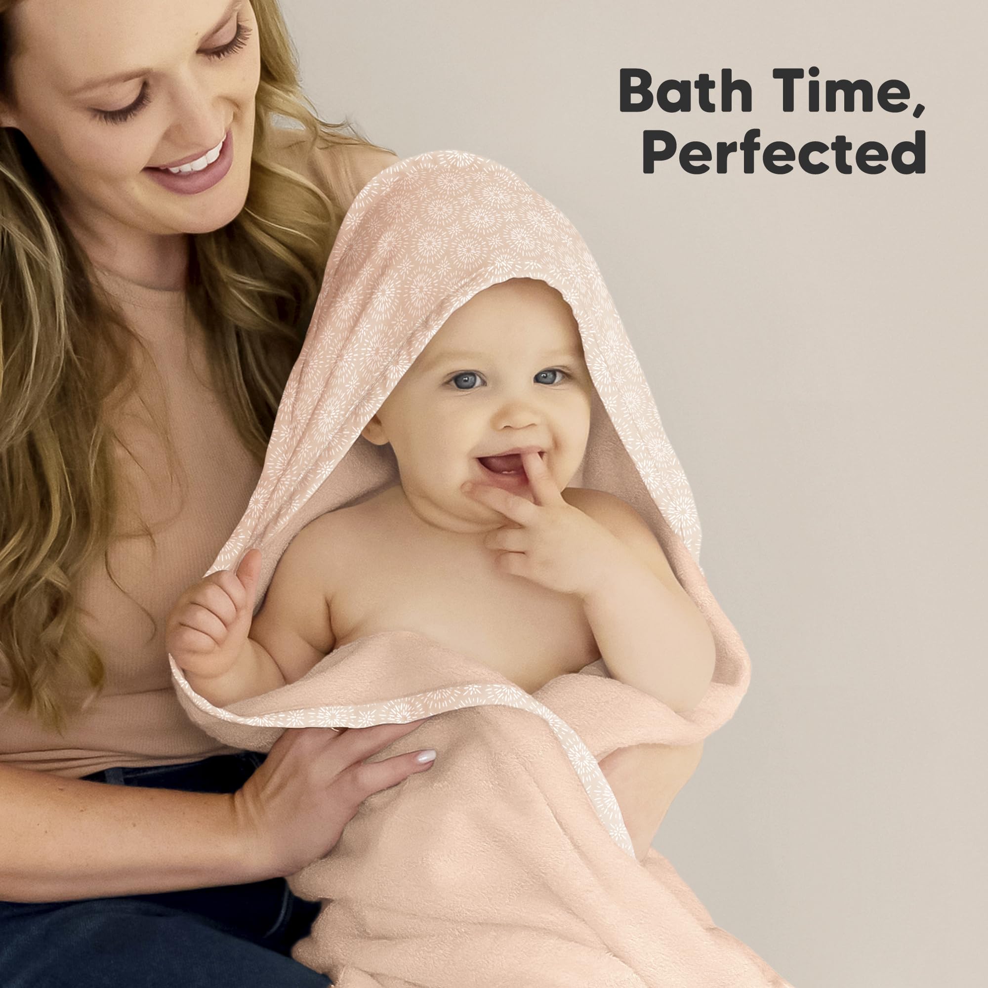 KeaBabies hooded towel babywearing closeup shows cozy comfort after bath.