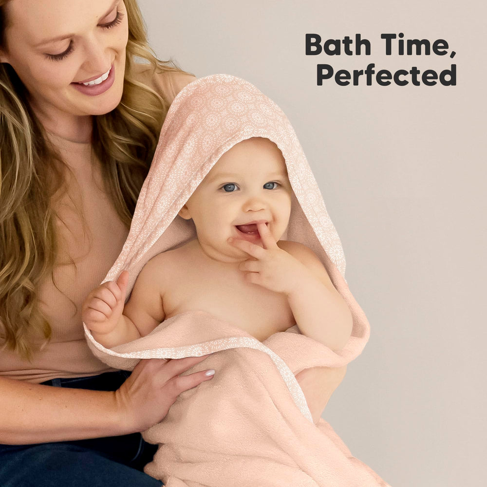 KeaBabies hooded towel babywearing closeup shows cozy comfort after bath.