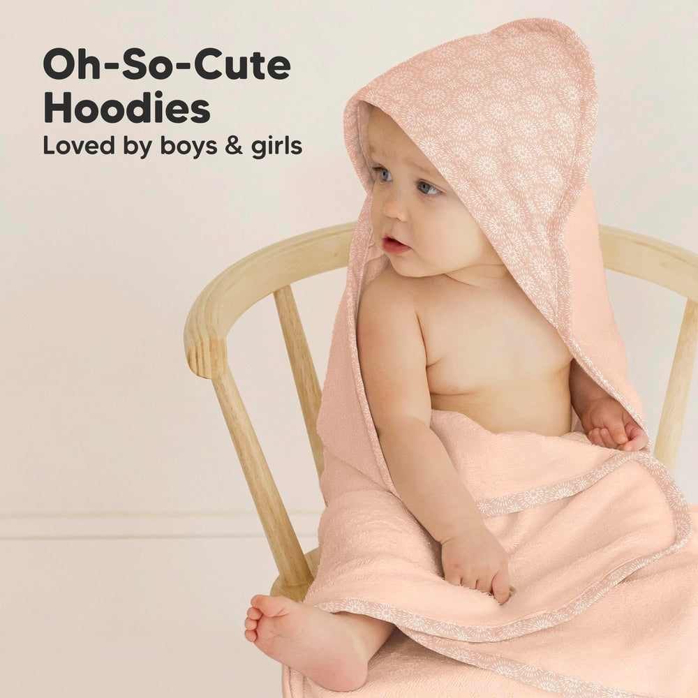 KeaBabies hooded towel on toddler demonstrates growth-friendly use from newborn to age 5.