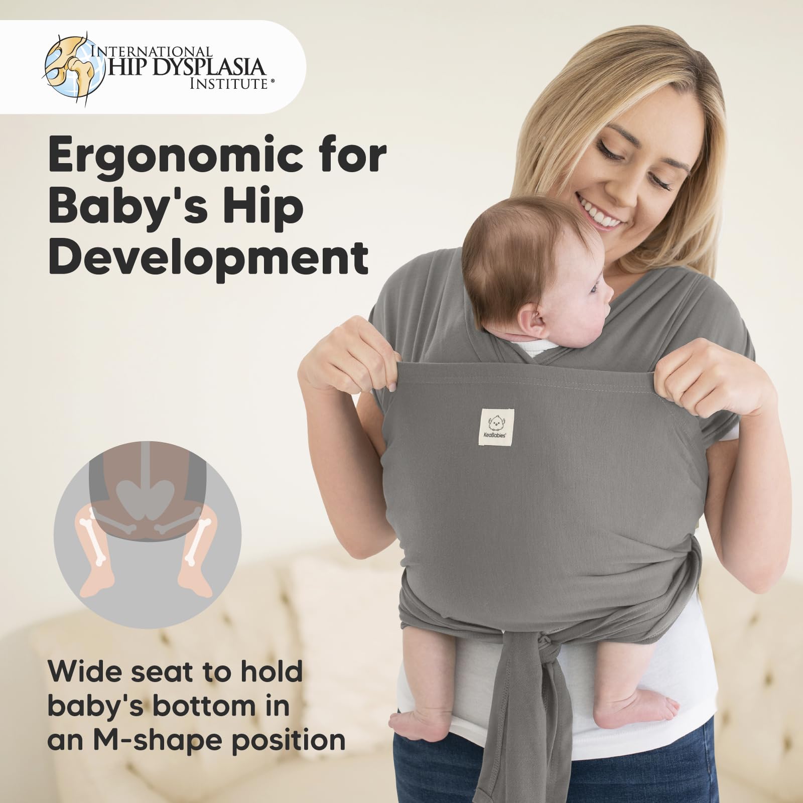 KeaBabies infant carrier graphite on parent illustrates versatile carrying on shoulders.